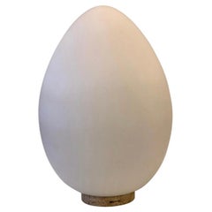 Large Massive Italian Glass Egg Lamp on Travertine Base by Ben Swildens