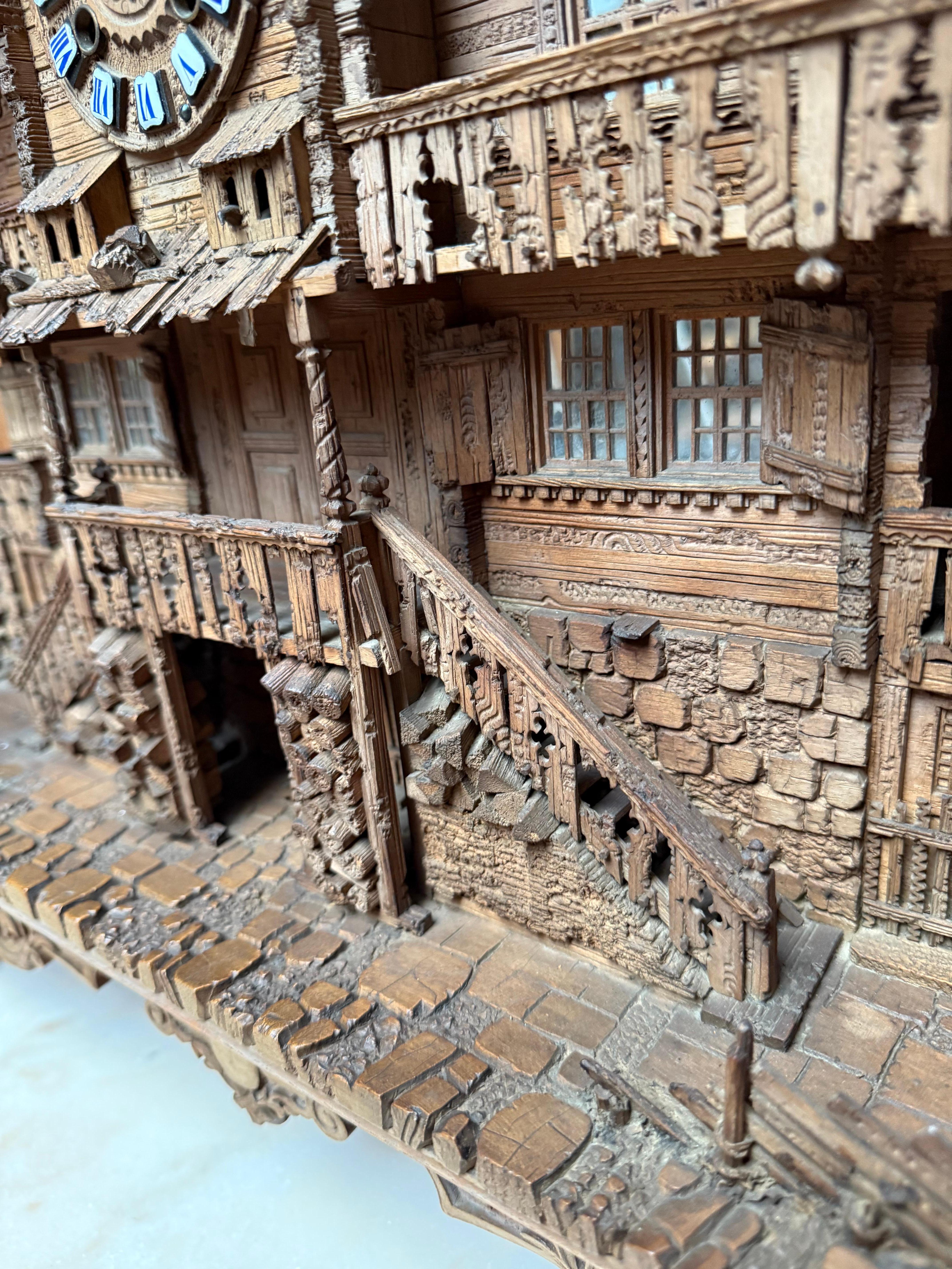 Large Masterly Carved Swiss Black Forest Nutwood Chalet with Clock and Music Box For Sale 7