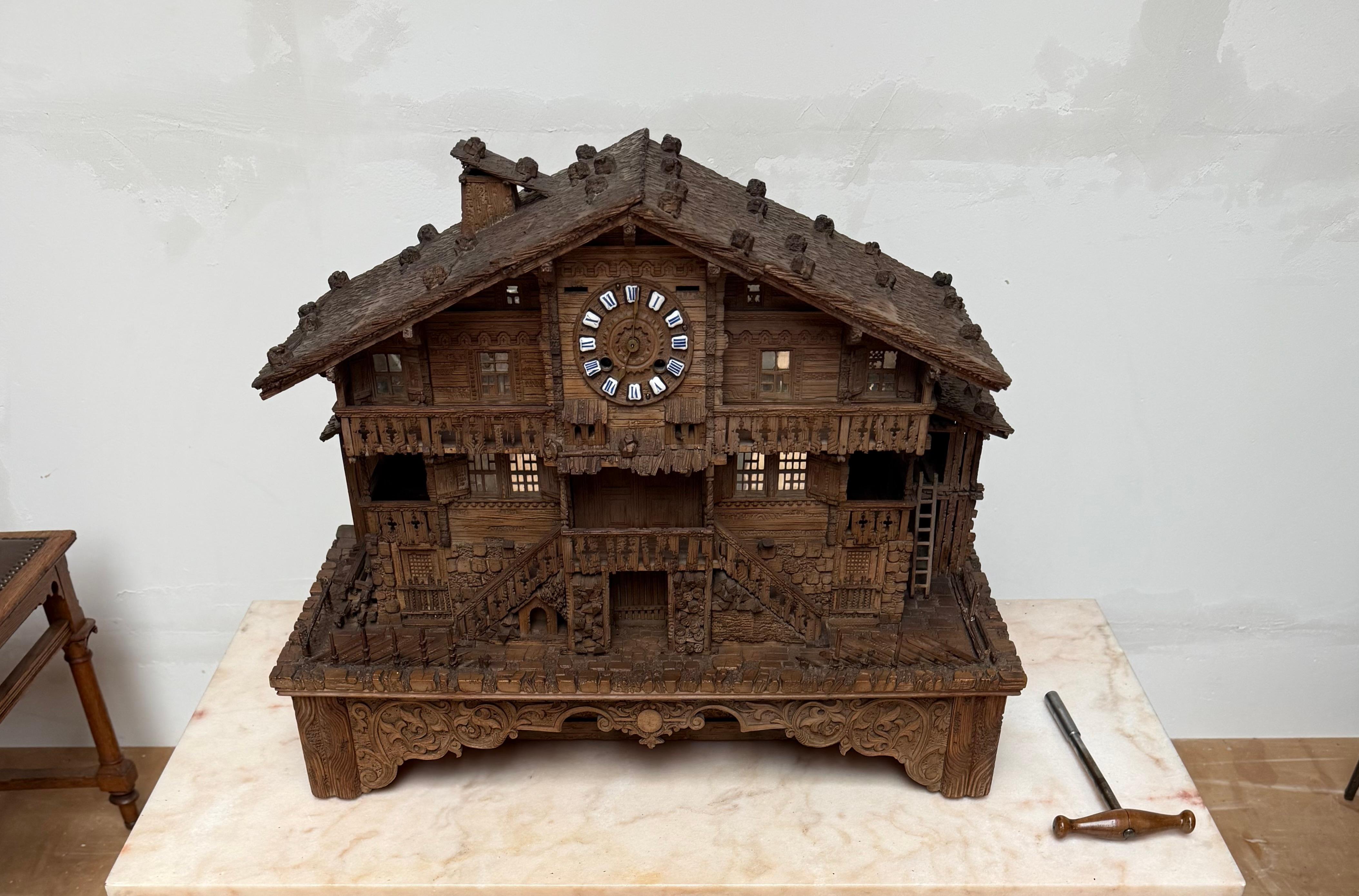 Large Masterly Carved Swiss Black Forest Nutwood Chalet with Clock and Music Box For Sale 10