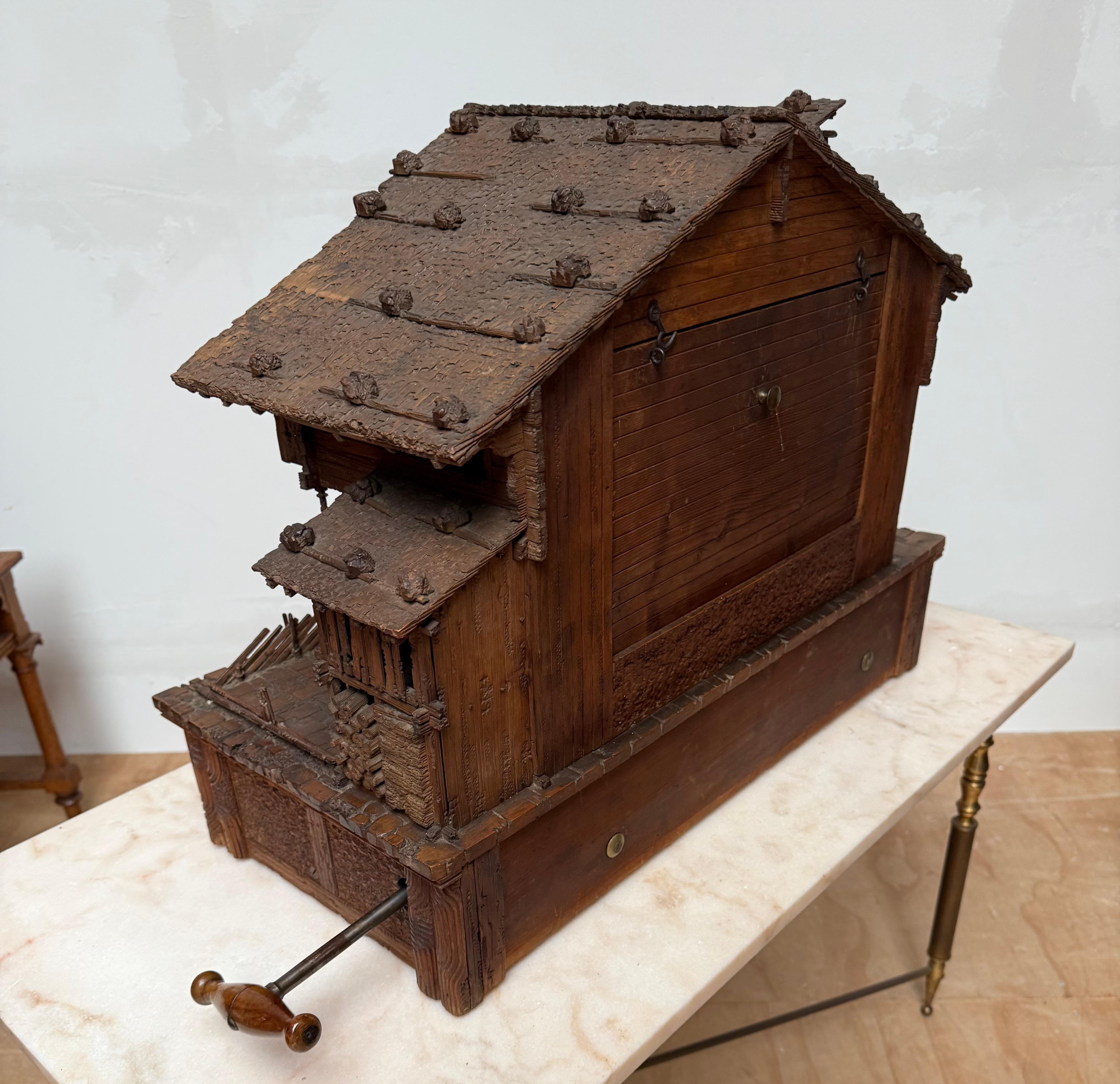 Large Masterly Carved Swiss Black Forest Nutwood Chalet with Clock and Music Box For Sale 12