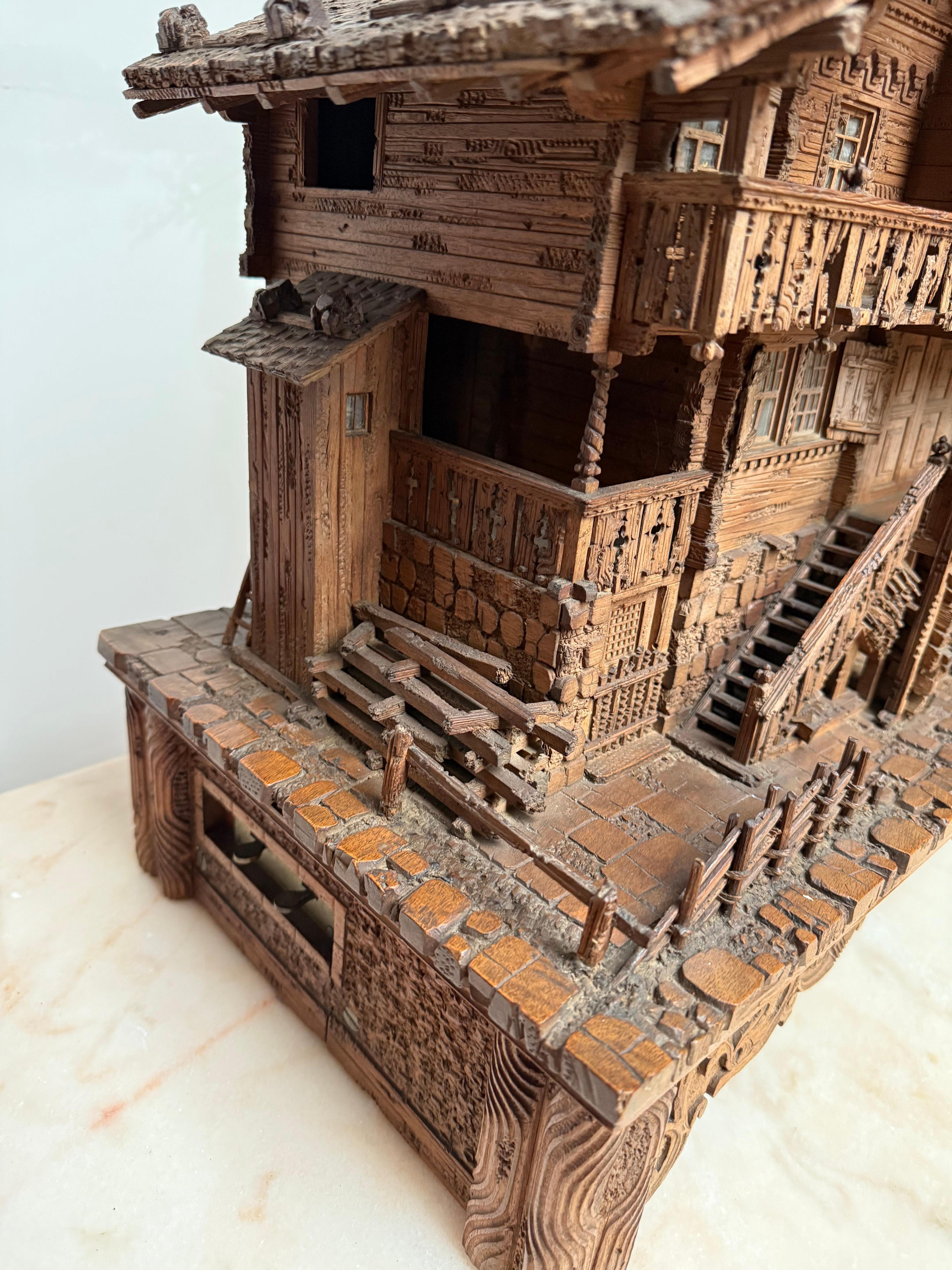 Large Masterly Carved Swiss Black Forest Nutwood Chalet with Clock and Music Box For Sale 3