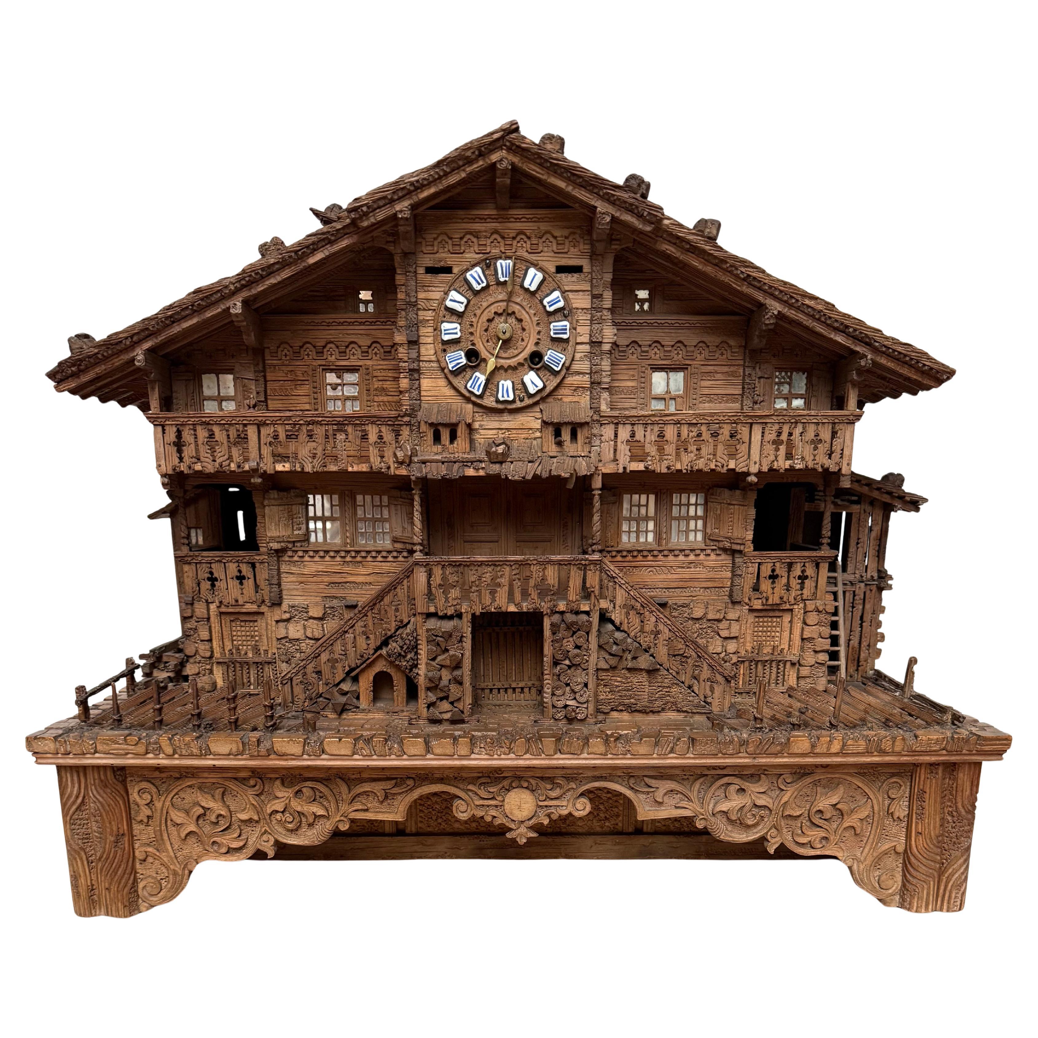 Large Masterly Carved Swiss Black Forest Nutwood Chalet with Clock and Music Box