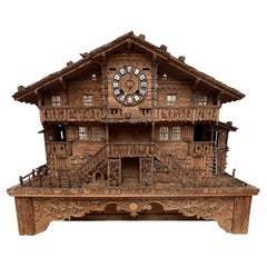Large Masterly Carved Swiss Black Forest Nutwood Chalet with Clock and Music Box