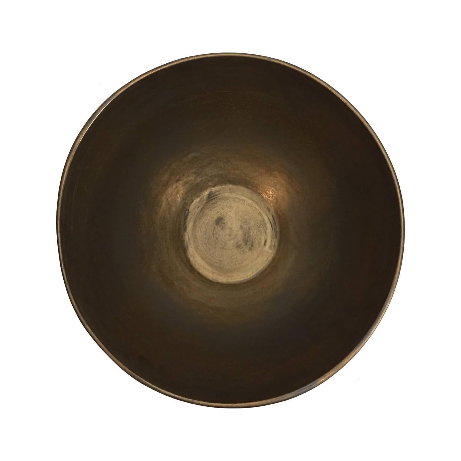Large matte black glaze curved ceramic bowl with gold glaze lip and interior by Sandi Fellman, 2018.