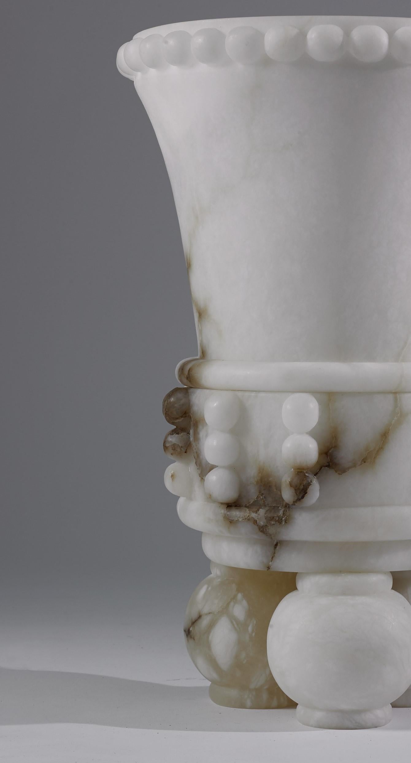 Very impressive large vessel sculpted from the purest alabaster found in Italy, inspired by the Mayan clay vessels used in ceremonies by this ancient civilization. A unique piece that stands as a very aloof time sculpture.

Made exclusively for