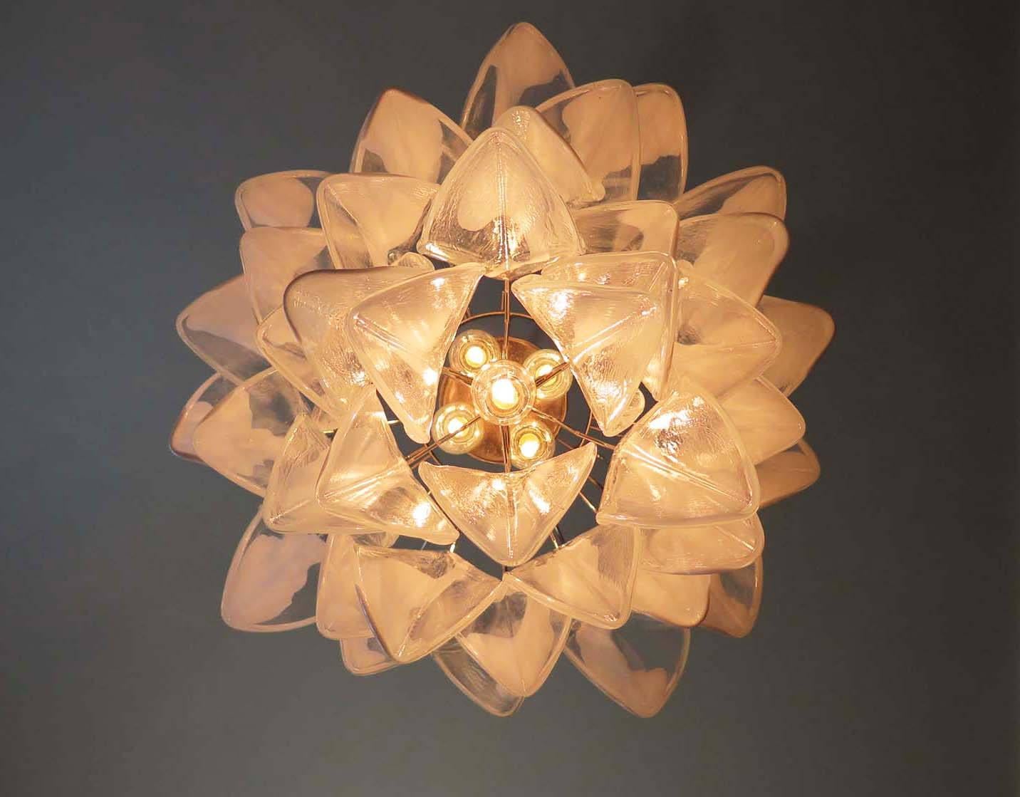 Italian Vintage Murano petal chandelier by Mazzega with 41 hand blown glass petals (transparent and white).

 