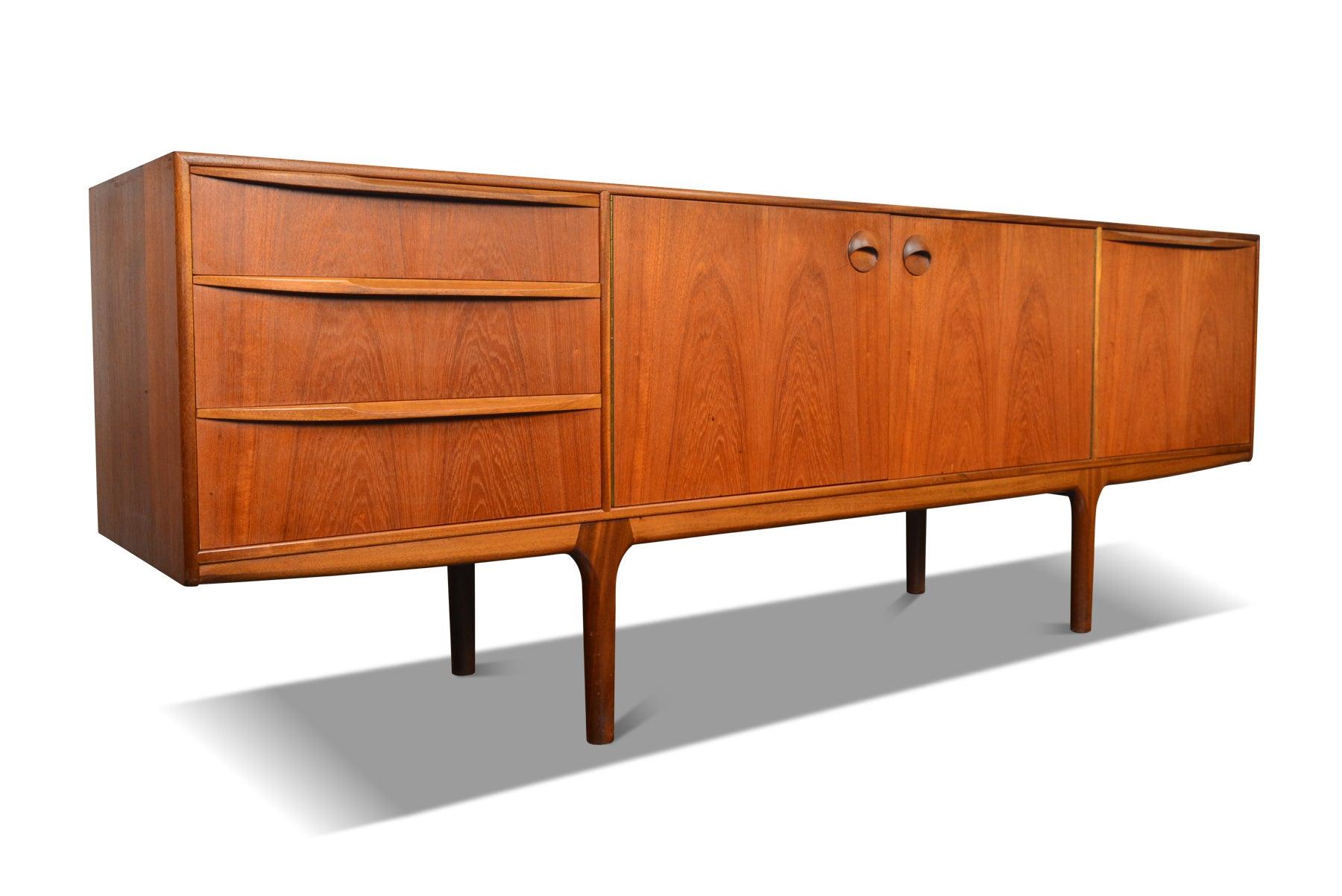 Origin: Scotland
Designer: Val Rossi
Manufacturer: McIntosh
Era: 1960s
Materials: Teak
Dimensions: 84” wide x 18” deep x 30” tall

Condition: In good original condition with light cosmetic wear.  Price includes refinishing / restoration

Lead time