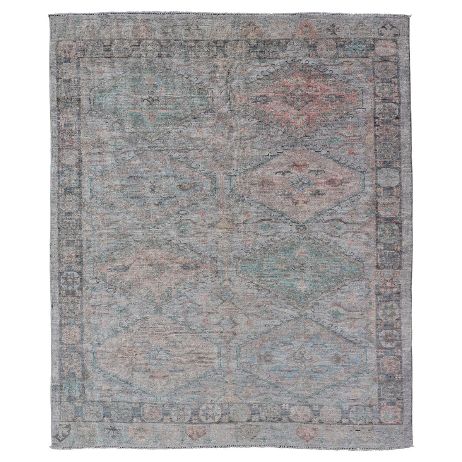 Large Medallion Design Modern Oushak on a Light Blue Field With Multi Colors  For Sale