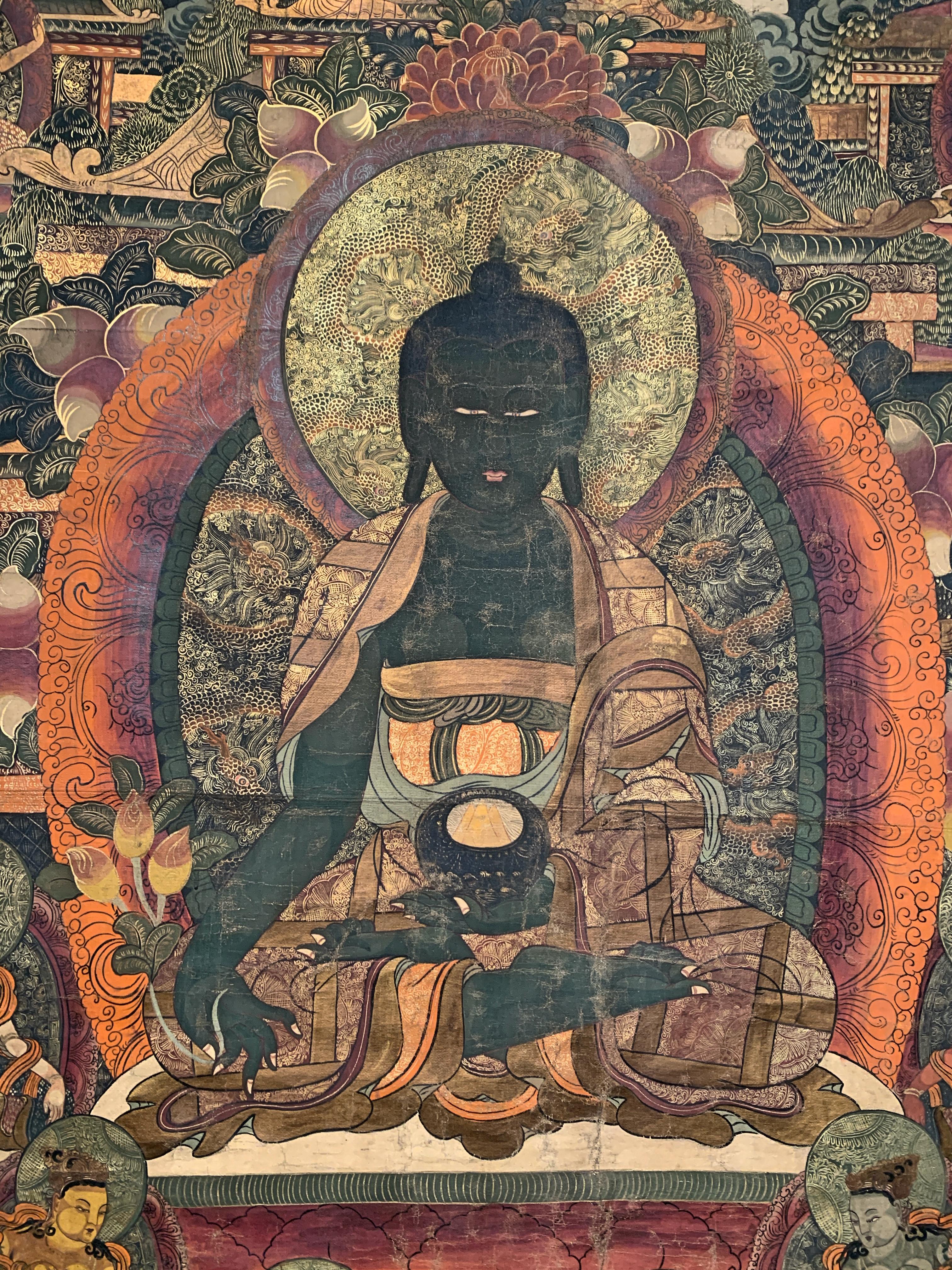 A large and finely painted Dharamshala school thangka of the Medicine Buddha, Bhaisajyaguru, mid-20th century, India.

Bhaisajyaguru, the Medicine Buddha, is the Buddha of medicine and healing. He is called and meditated upon to alleviate both
