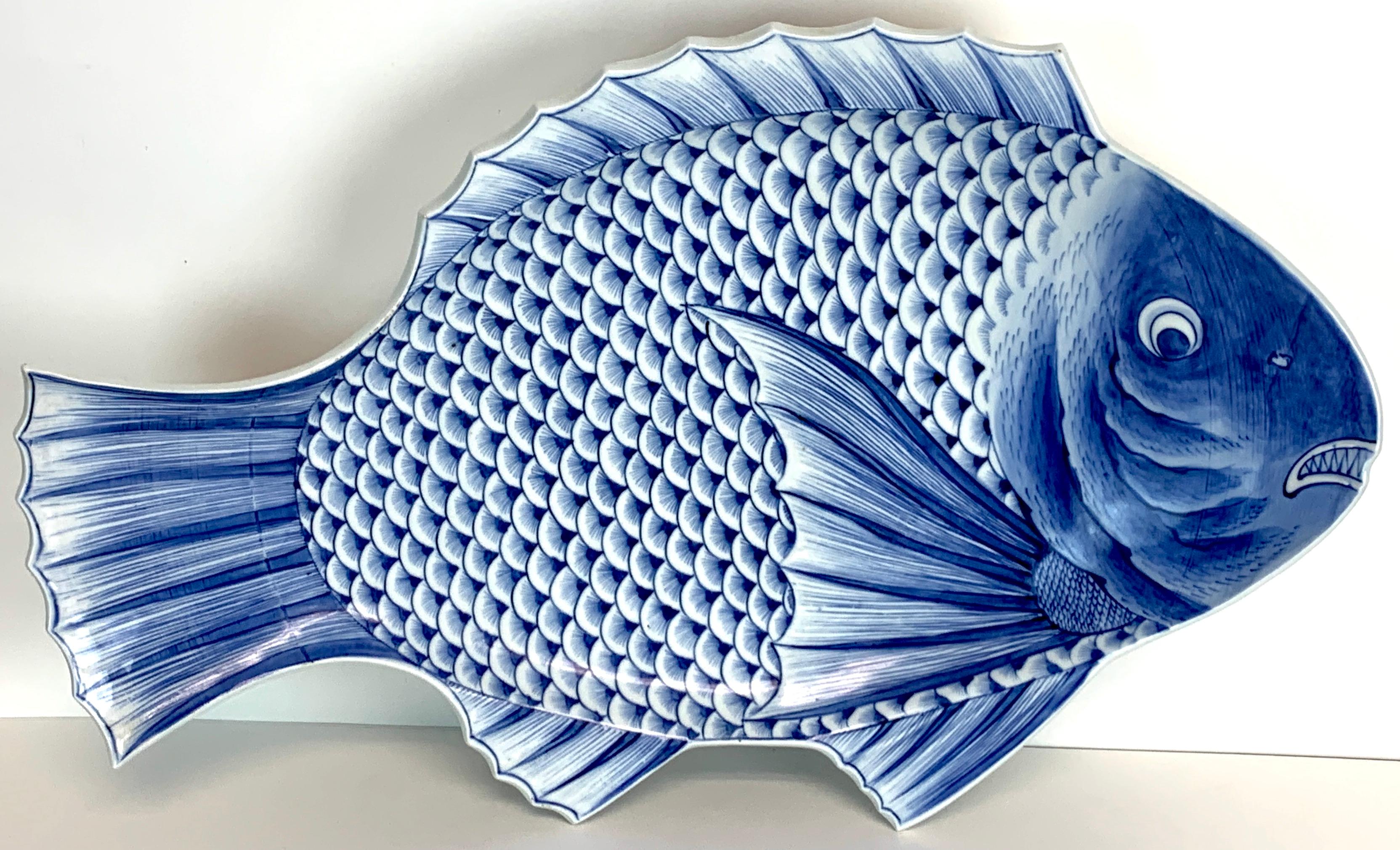 Large Meiji Imari blue and white fish plate, by Fukagawa VII
Subtle intricate decoration, a stunning example, marked, circa 1890
This examples measures: 18.5 inches wide x 12 inches high.
Part of a collection of eight fine Imari examples, the VII
