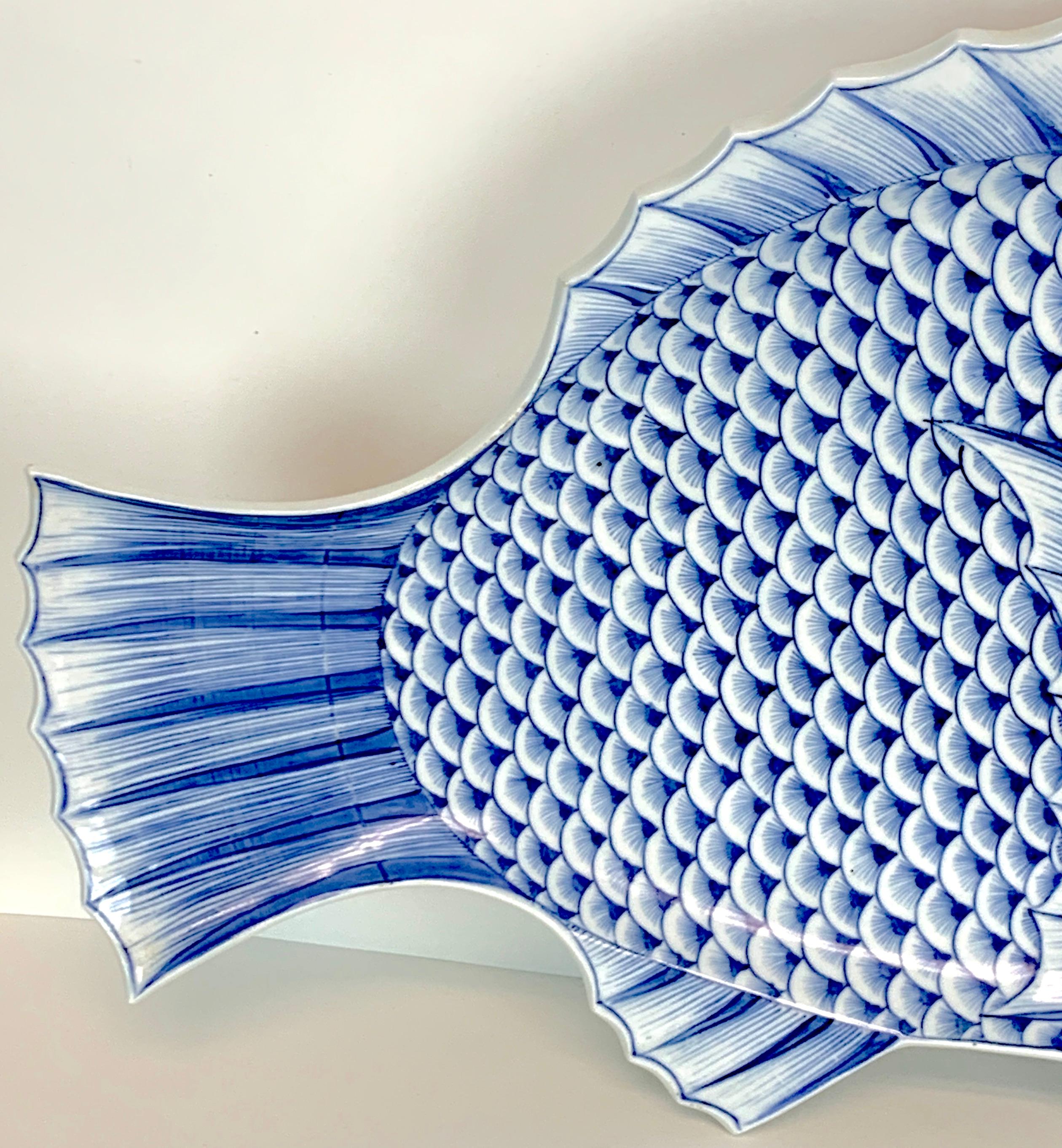 blue and white fish plates