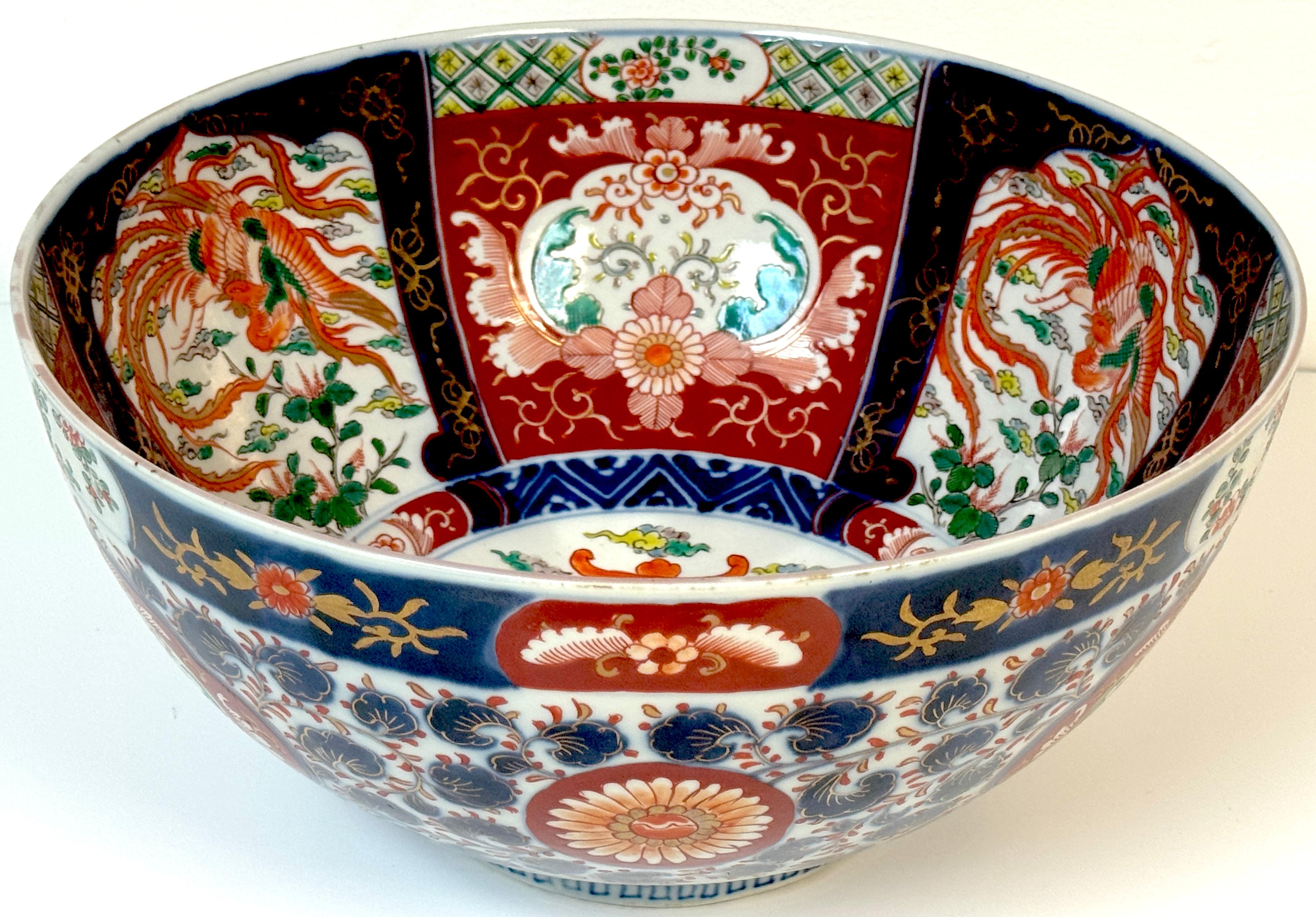 Japanese Imari Deep Center Bowl with Phoenix and Floral Motifs, Signed, Meiji Period, Attributed to Fukagawa, Circa 1880–1910

A richly enamelled and finely detailed Meiji-era Imari porcelain deep bowl, measuring 13.5 inches in diameter and 6.5