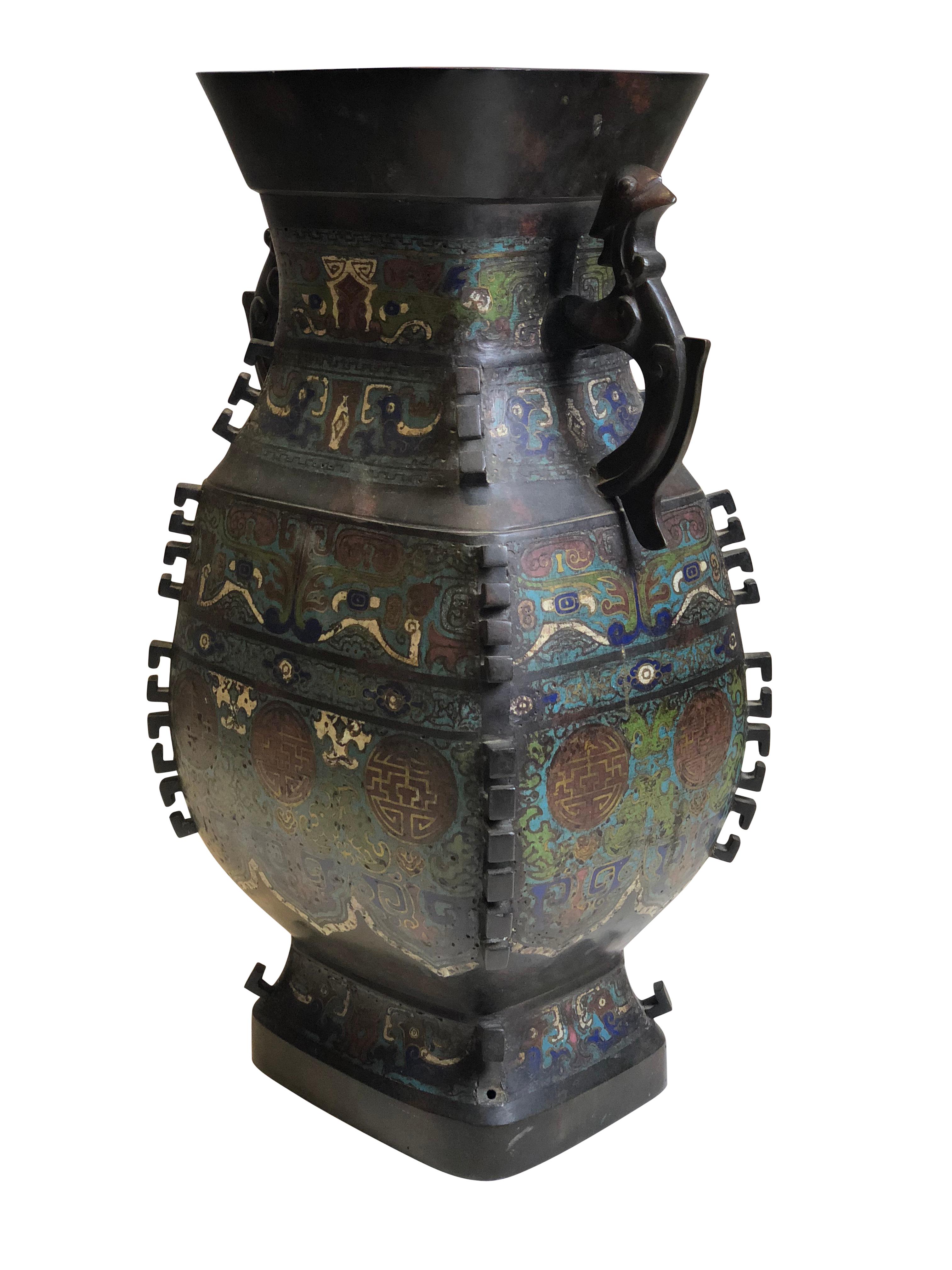 Large Meiji period Japanese bronze and Champlevé enamel vase

Japan, 19th century

Decorated and styled in the Chinese taste

Marked underneath with Chinese charachters.
    