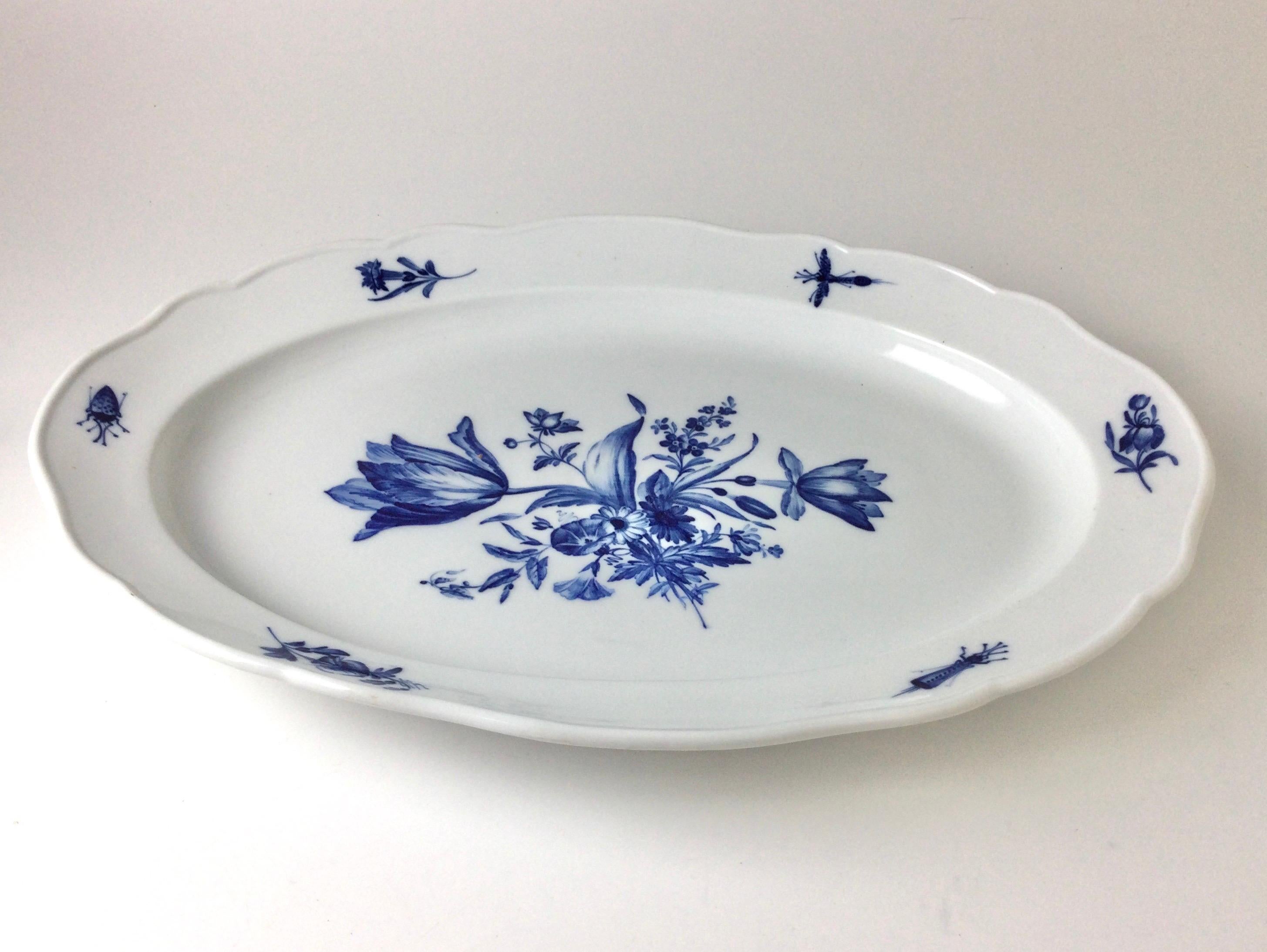 Large Meissen platter with painted blue bouquet of flowers and insects or bugs on rim. 20 1/4