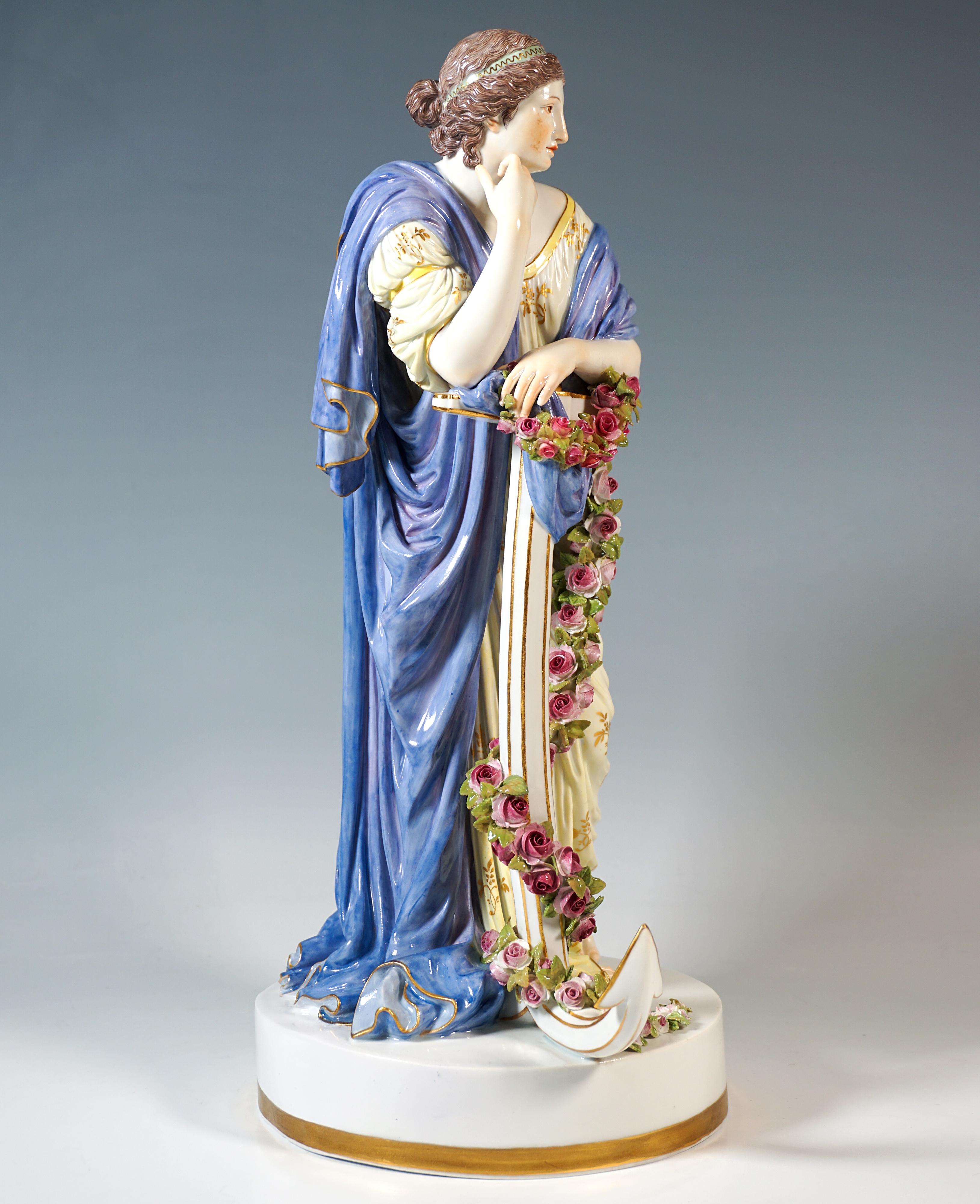 Excellent large and rare Meissen figurine from the 19th century:
Youthful beauty with her hair tied up in a floor-length dress and cape that drape around her body in rich and elaborate folds, resting on a large anchor entwined with a magnificent