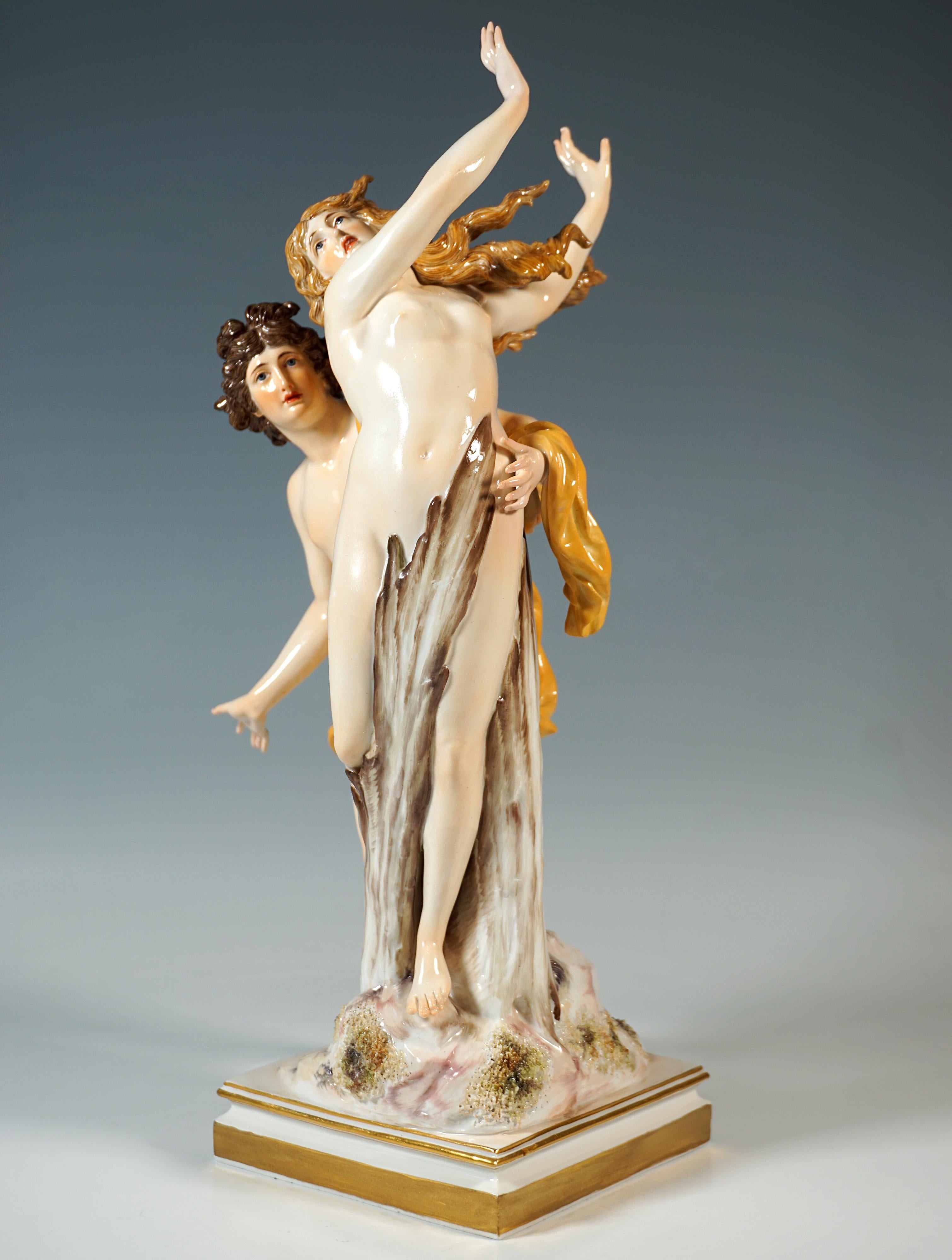 Excellent large and rare Meissen figurine group from the 19th century:
Apollo clothed with a cloak embraces Daphne from behind, who is fleeing from him and has already frozen into a laurel tree in a twisting movement.
Based on a stepped, fluted