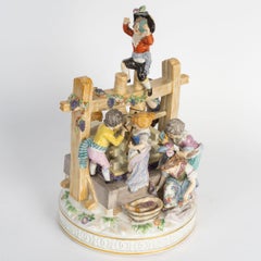 Large Meissen Porcelain Figurine Set, “The Wine Press” Early 20th Century.