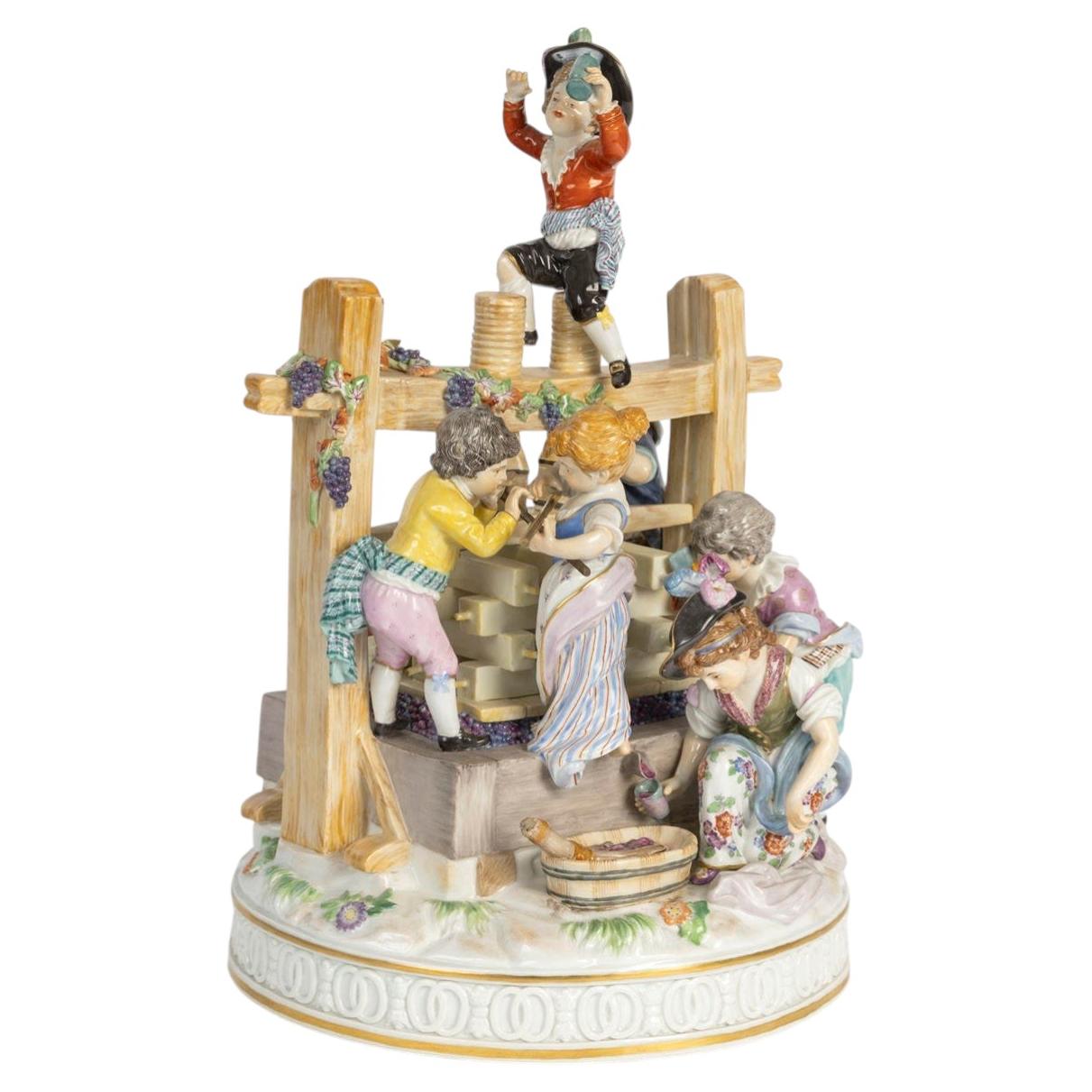Large Meissen Porcelain Figurine Set, “The Wine Press” Early 20th Century.