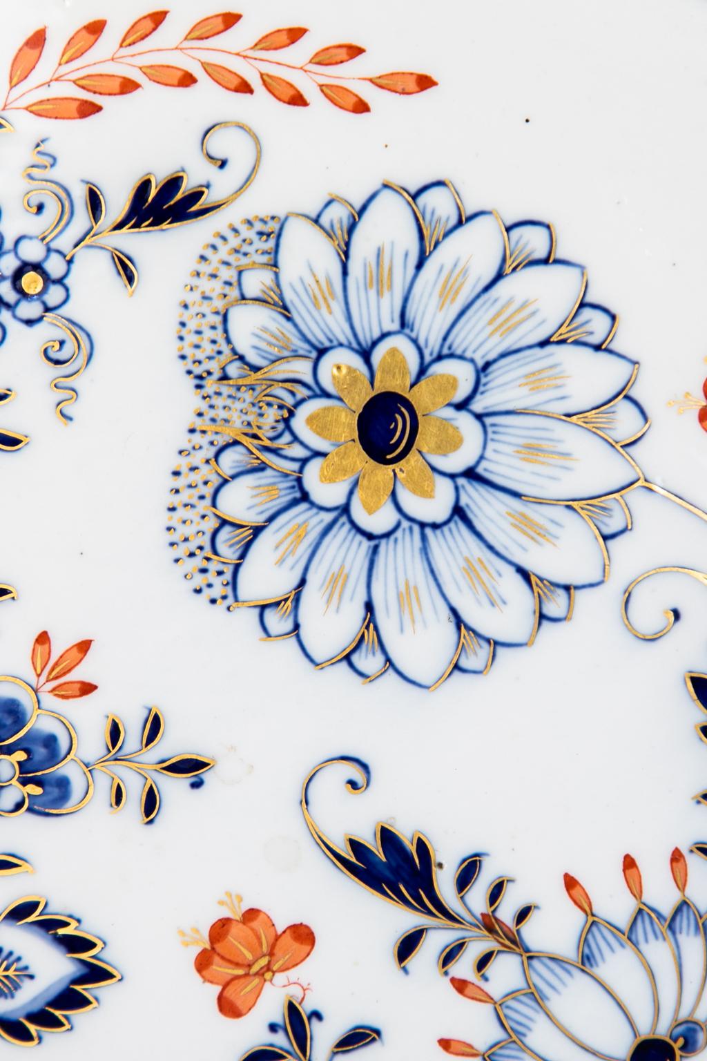 Large Meissen serving platter, in immaculate condition. It has a red and blue floral pattern with gilt highlights.


         