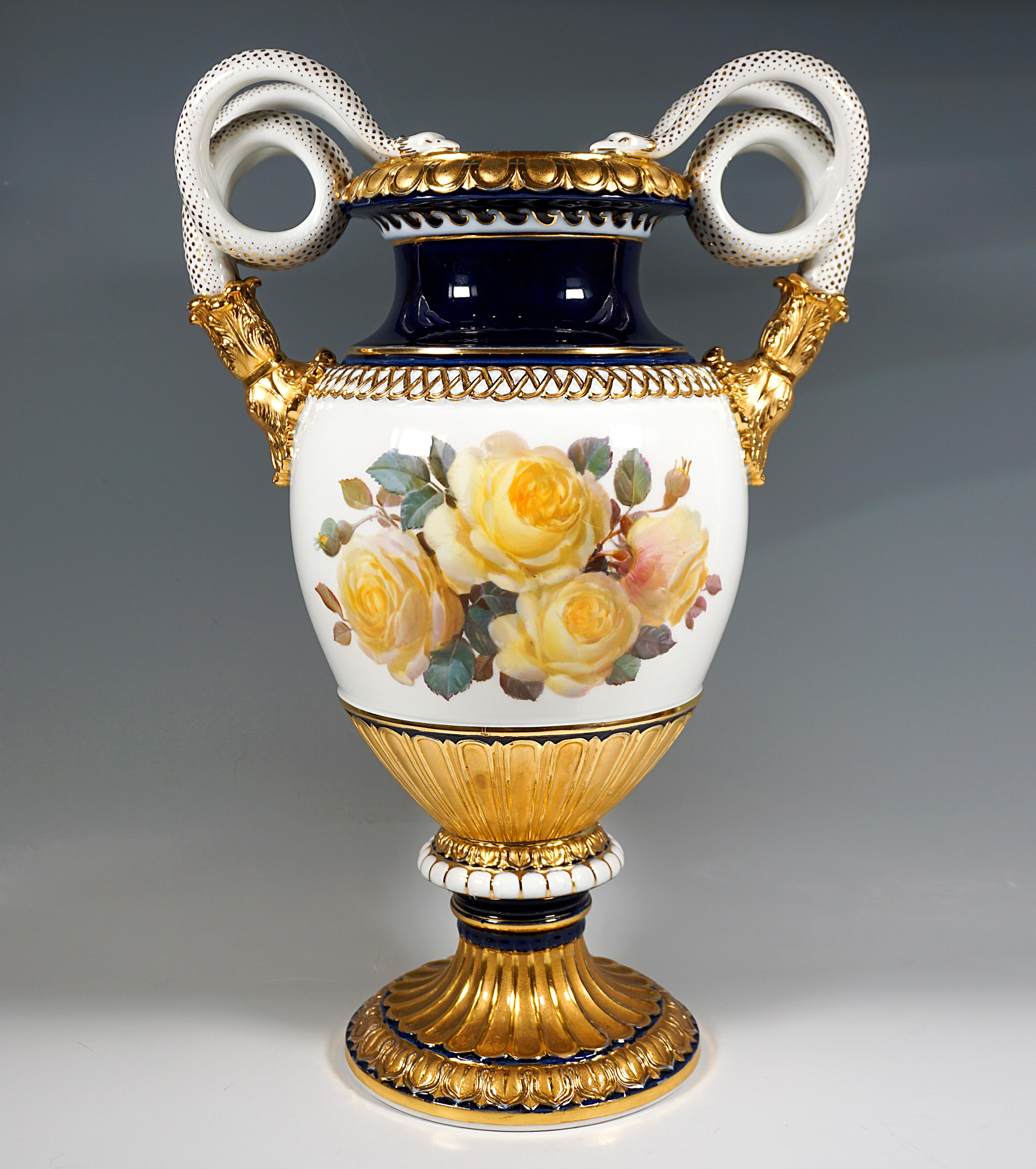 Very large double-snake-handled vase in baluster form on a mounted funnel-shaped base, laterally raised handles in the form of coiled pairs of snakes, white and cobalt-blue background, front and back fine polychrome roses soft painting in purple and