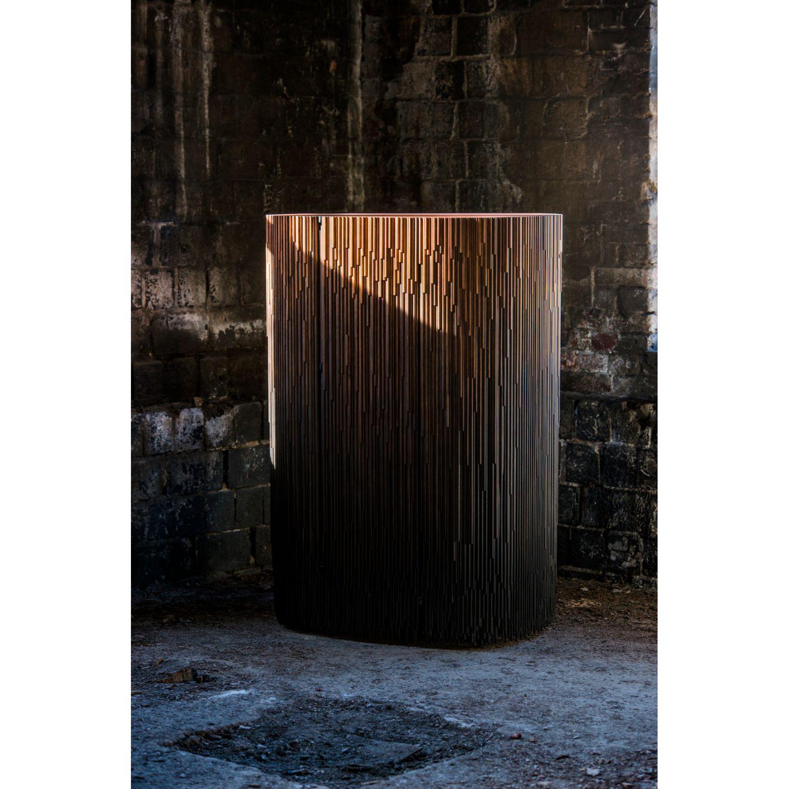 Large Melt cabinet by Antrei Hartikainen
Materials: Stained and lacquered or untreated pine
Dimensions: W 95 x D 73 x H 140 cm

In the Melt cabinets industrially treated pine transforms into an unique art composition. The cabinet has been