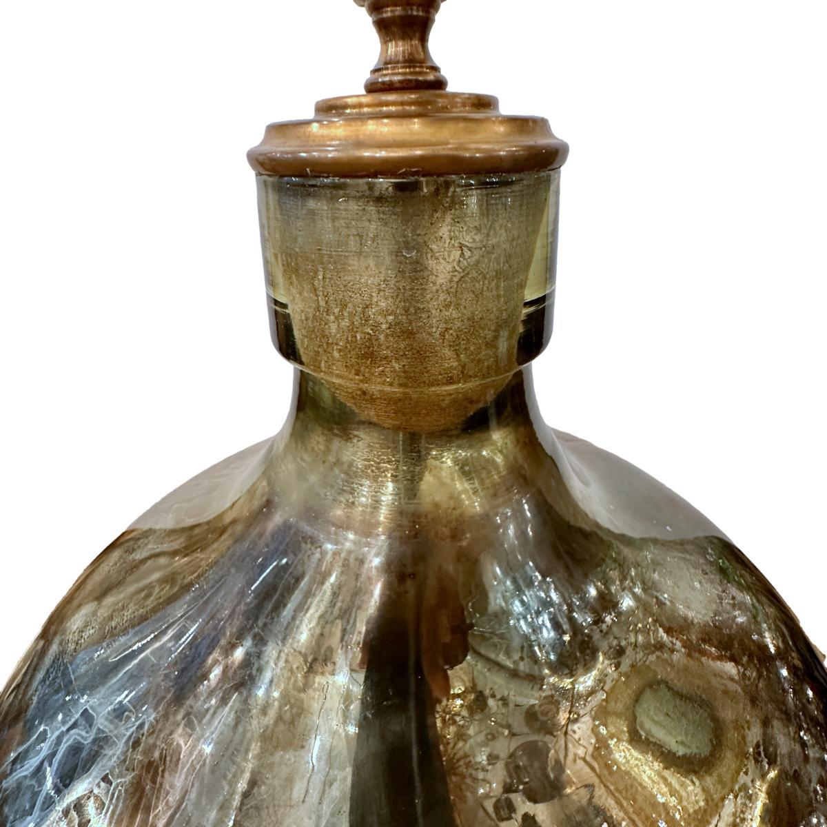 A single circa 1940's Italian oversized etched mercury glass lamp with bronze base.

Measurements:
Height of body: 27