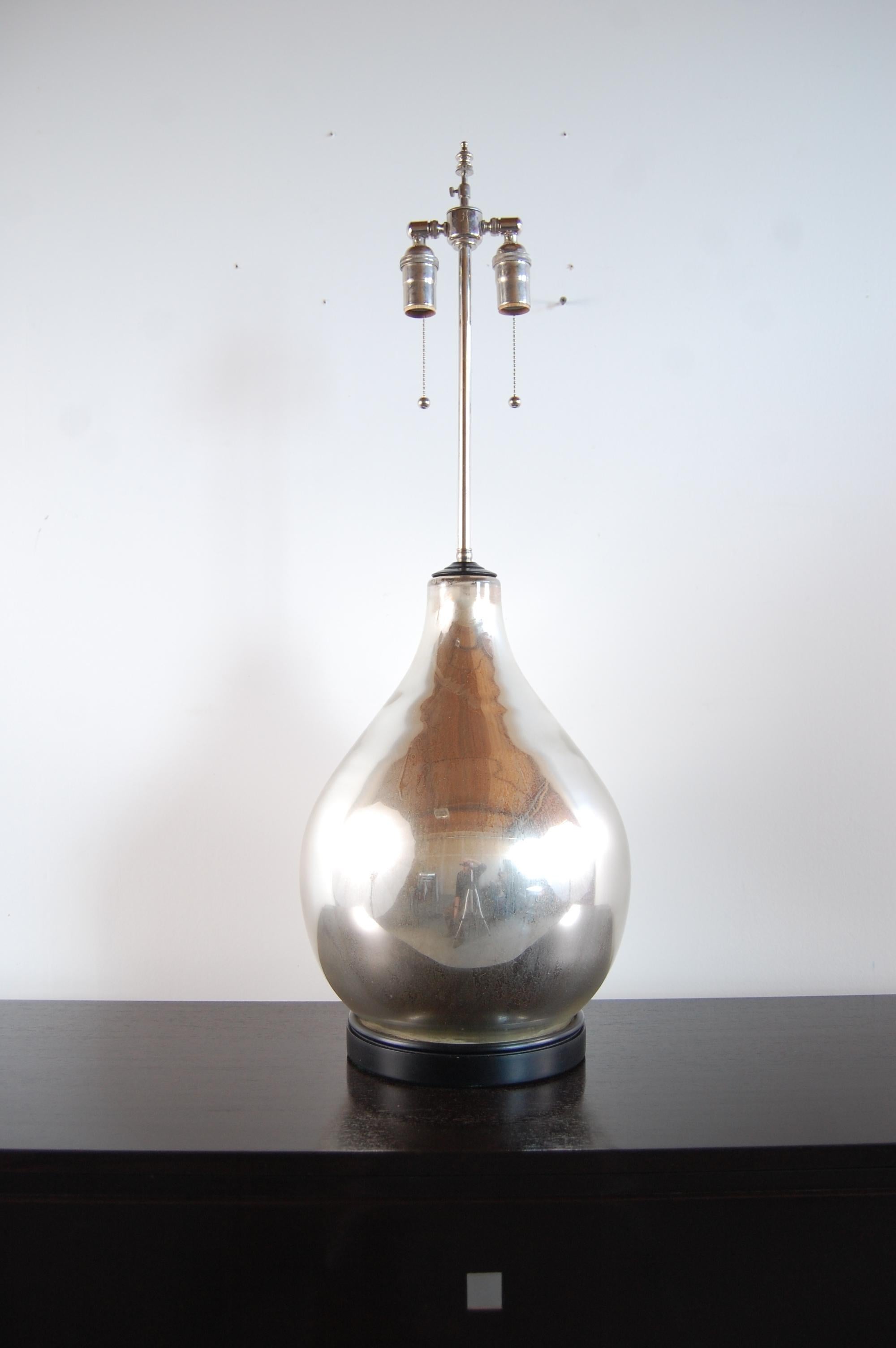 Large mercury glass lamp, circa 1968. Completely re-wired for safety, as all vintage lighting should be. Outfitted with top of the line, nickel plated brass hardware. Base and cap are steel, painted black. Body of lamp is 12 1/2