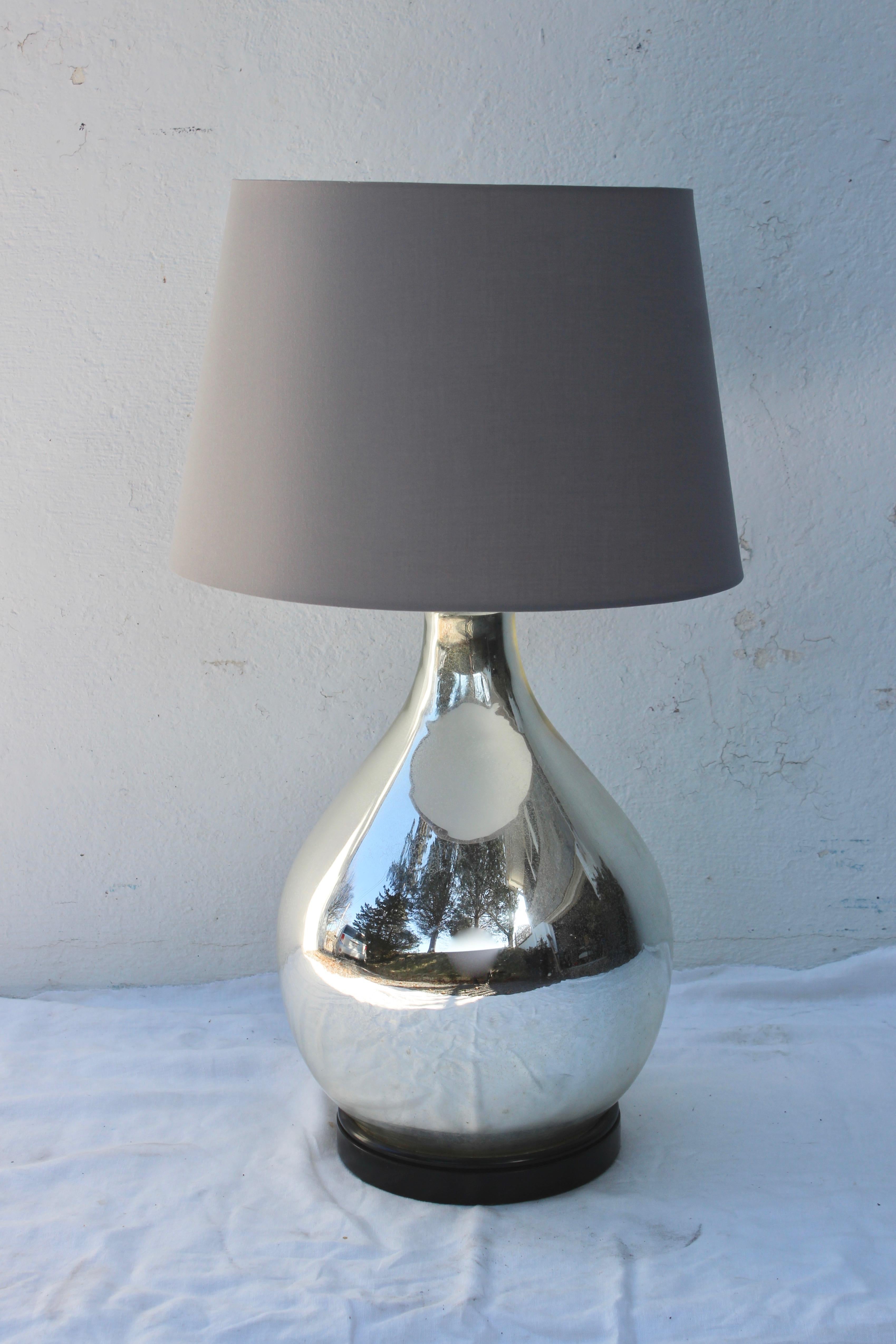 Large Mercury glass table lamp with painted black wood base and cloth covered twisted cord. Lampshade not included.