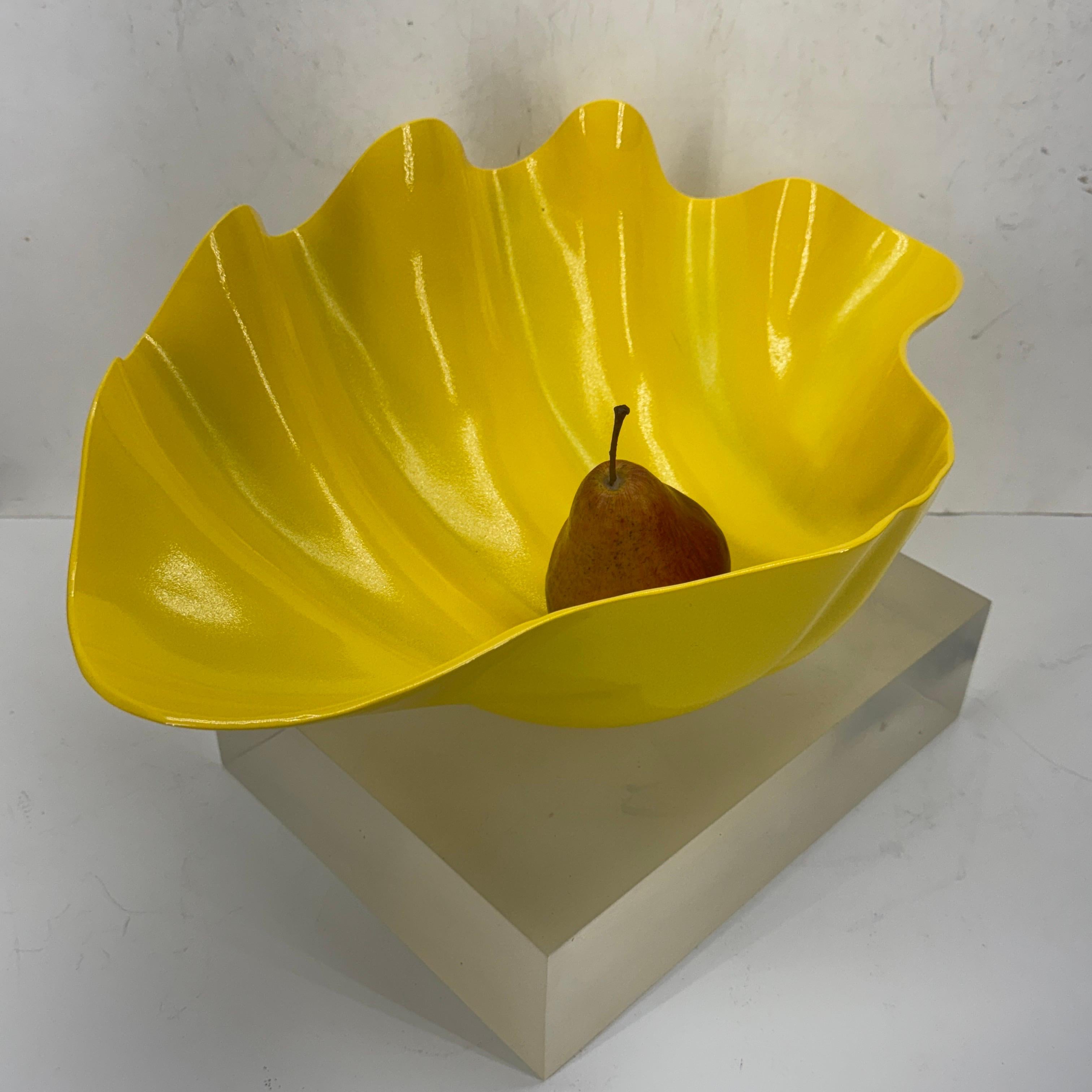 Impressive vintage large clam shell that has been powder-coated in bright sunshine yellow. This shell features intricate detailing on the exterior. This piece is very versatile, suitable for any classic, coastal or contemporary and modern style