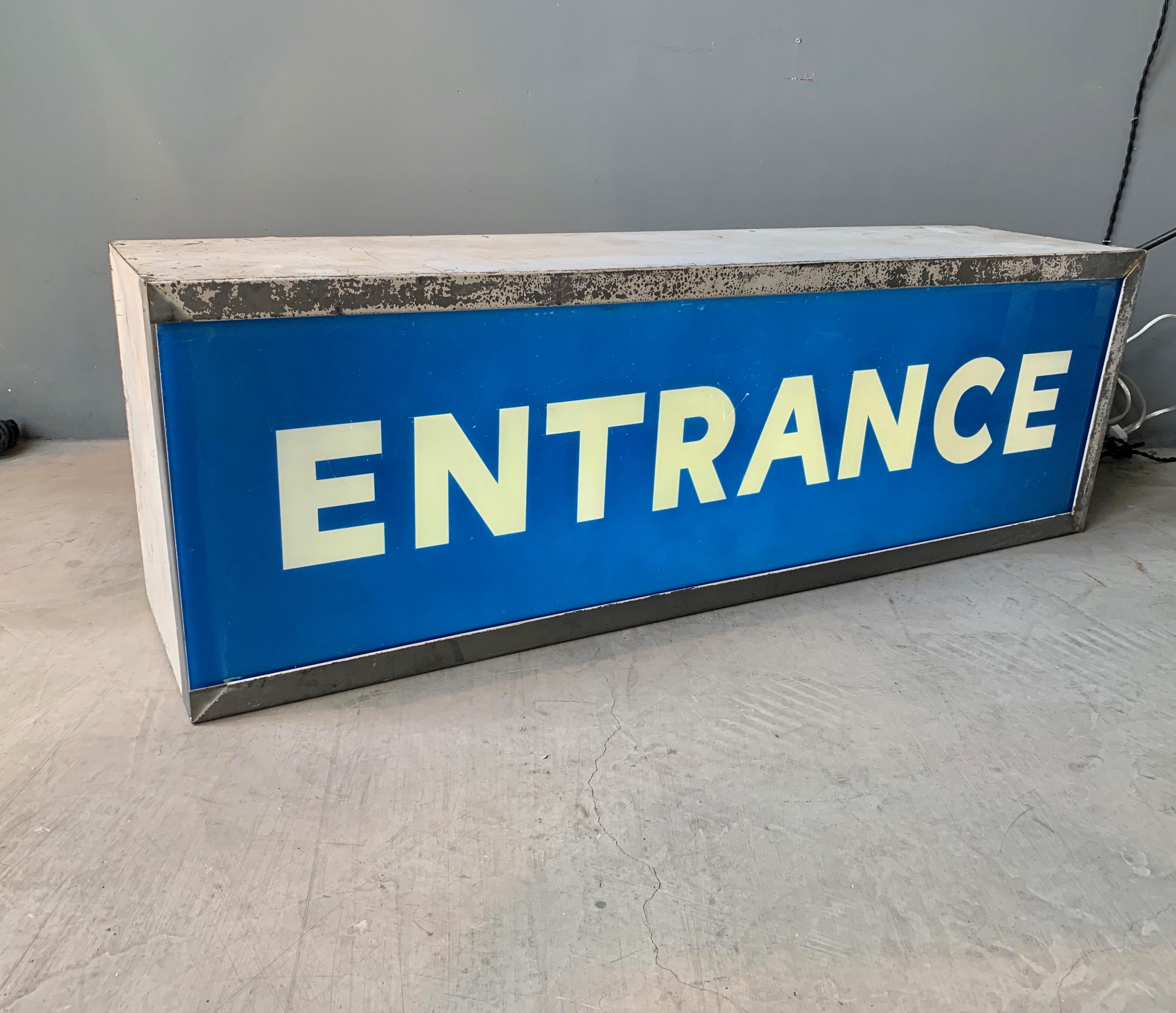 3 foot long metal light box with acrylic ENTRANCE sign. Fluorescent light inside. Works perfectly. Great vintage condition. Hand switch on cord. Great coloring.