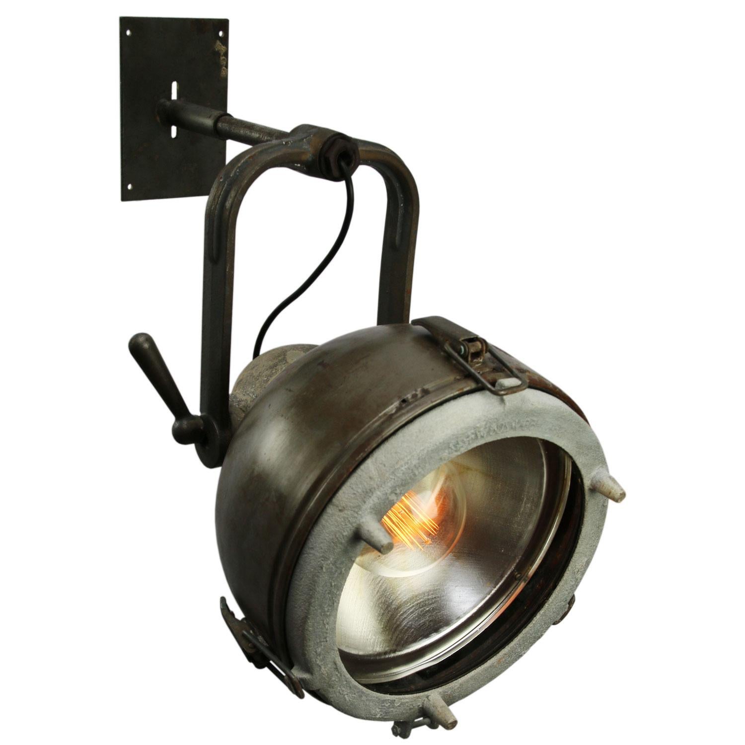 Large industrial wall light. 
Cast aluminium, cast iron, brass shade and clear glass

Weight: 10.20 kg / 22.5 lb

Priced individual item. All lamps have been made suitable by international standards for incandescent light bulbs,