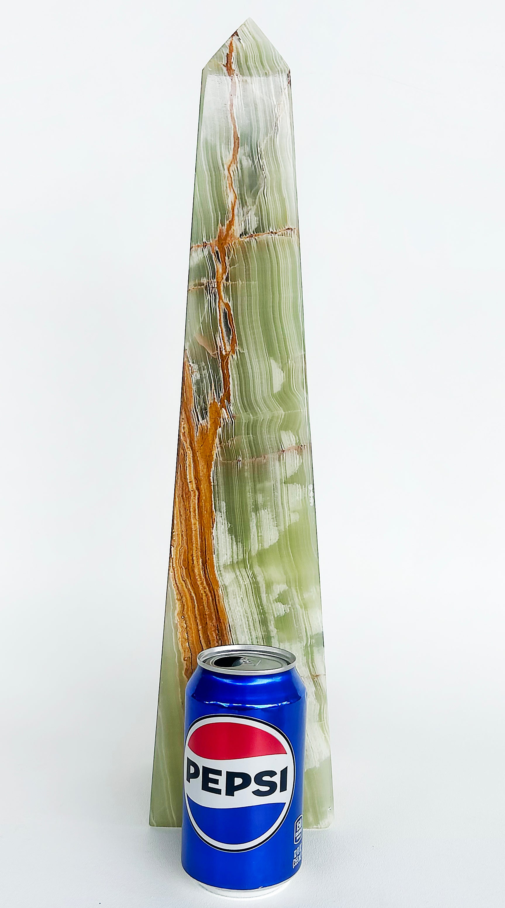 Large Mexican Green Onyx Tower Obelisk Specimen Weighing 20 lbs.

Offered for sale is a very large specimen Green Onyx Tower Obelisk. It is a variation of the renowned Onyx stone, distinguished by its deep green hue. This stone is cherished for its