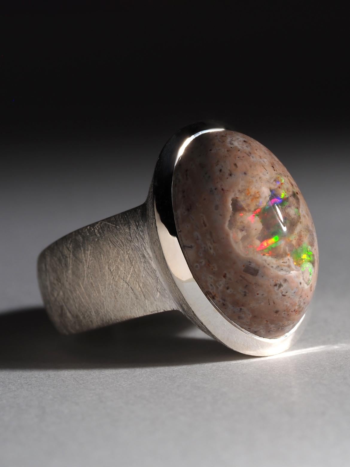 Large silver ring with natural Mexican Opal 
Opal origin - Mexico 
opal measurements  - 14 x 19 mm, 
weight of Opal - 17.8 carat
ring weight - 14 grams
ring size - 8 3/4 US, diameter 18.75 mm, N 19, 59 circumference