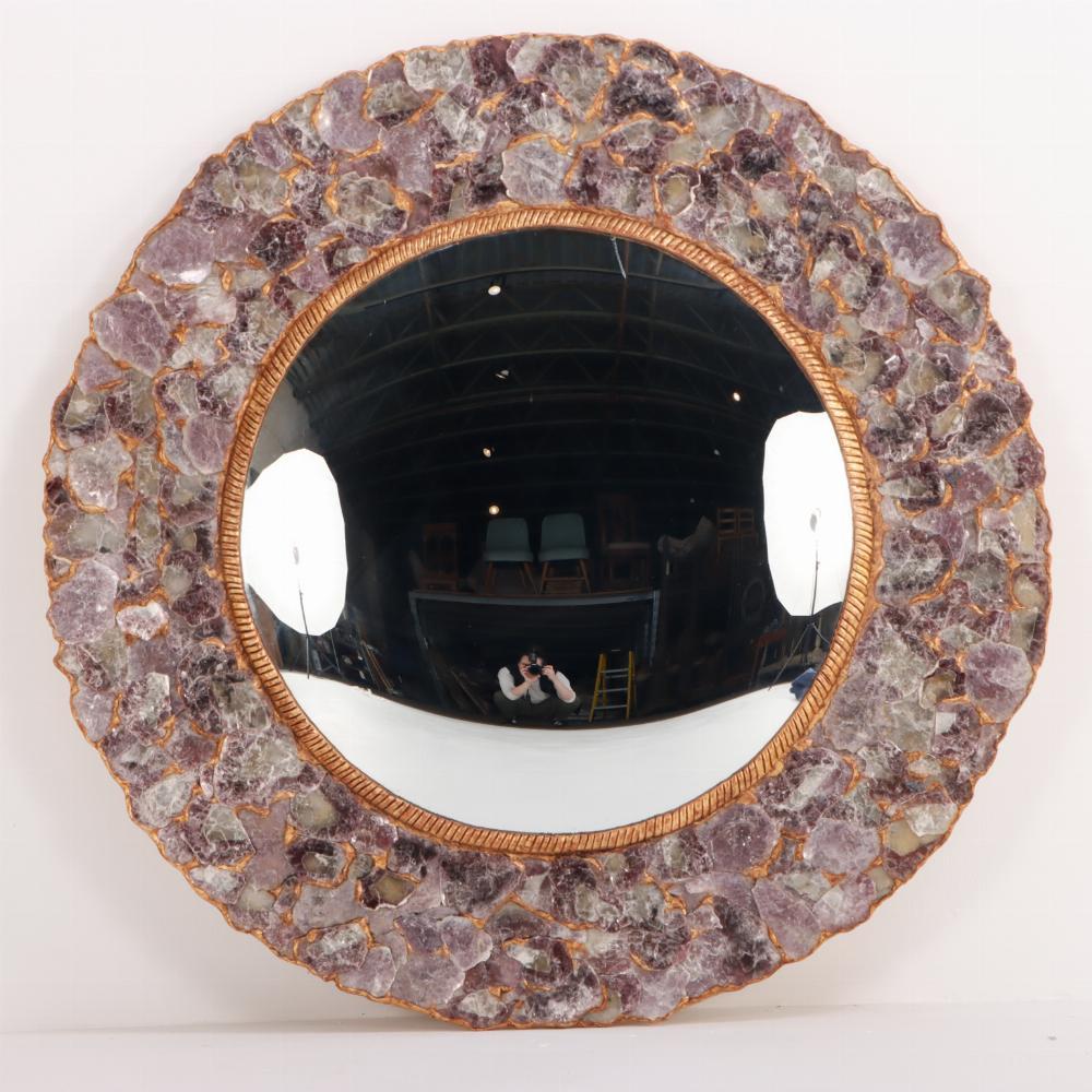 This wonderful statement mirror was constructed with Lilac Mica and is surely one of a kind. A stunning look and ready to hang in your entryway, dressing room or anywhere in your interiors needing a glamourous and bold update.
