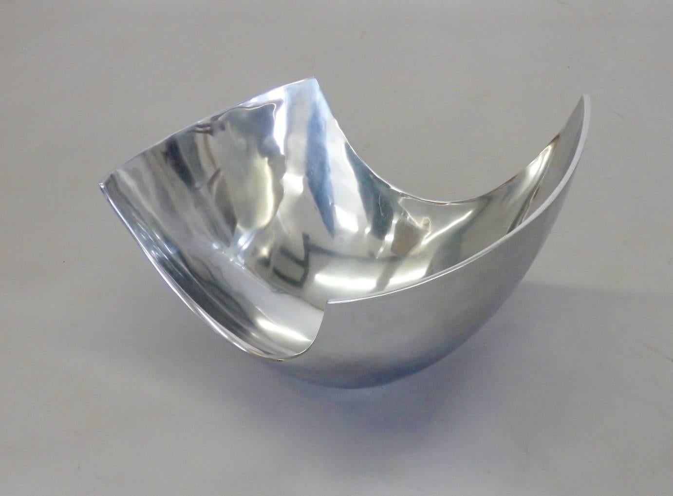 Large asymmetrically shaped aluminum bowl. Makers mark on underside . 