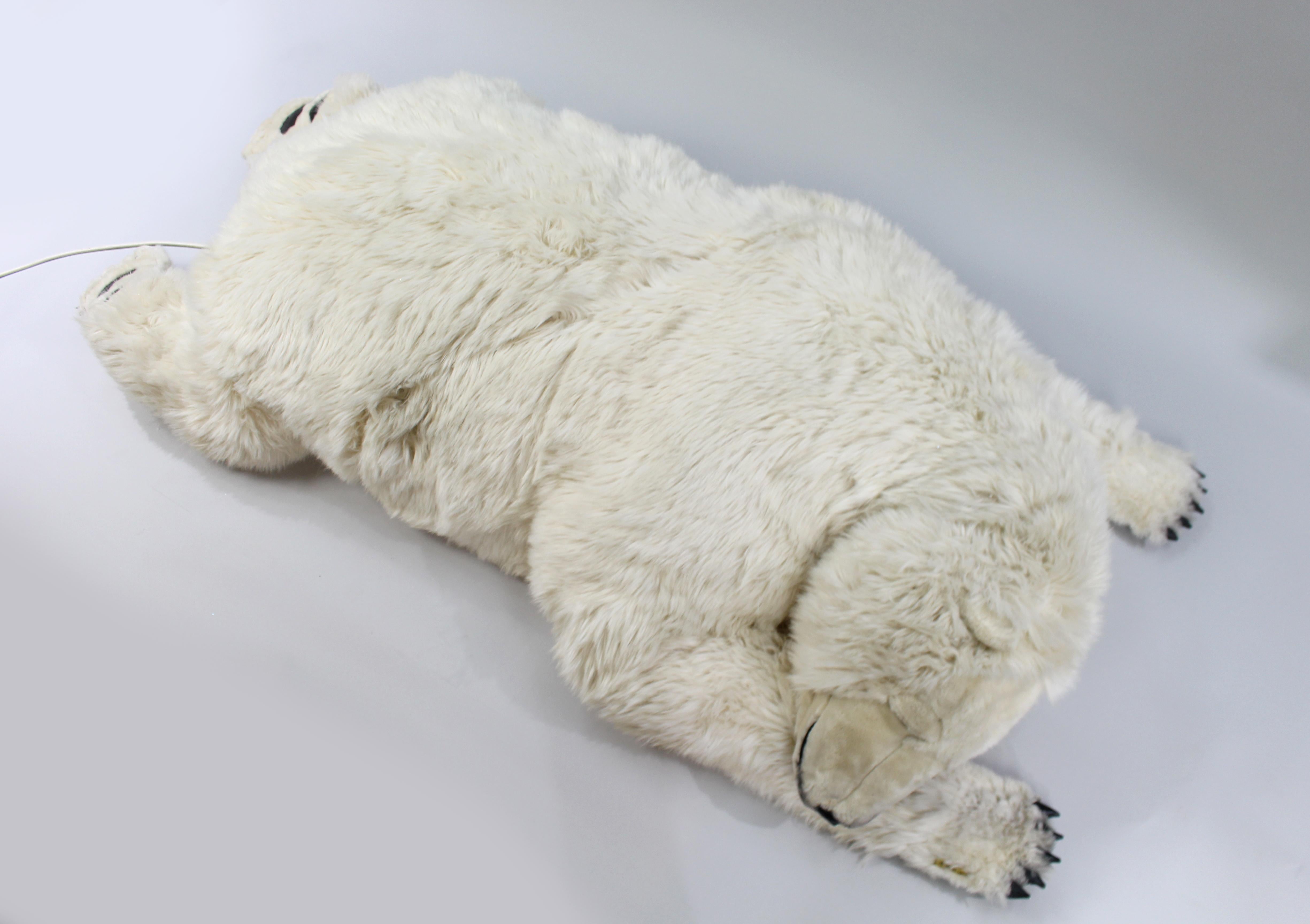 Manufacturer 
Michel Taillis, France

Composition 
Fabric, interior frame with mechanism

Condition 
Offered in good condition. Ex-display piece
 

 

Impressive automated exhibition sleeping polar bear model made by French firm Michel