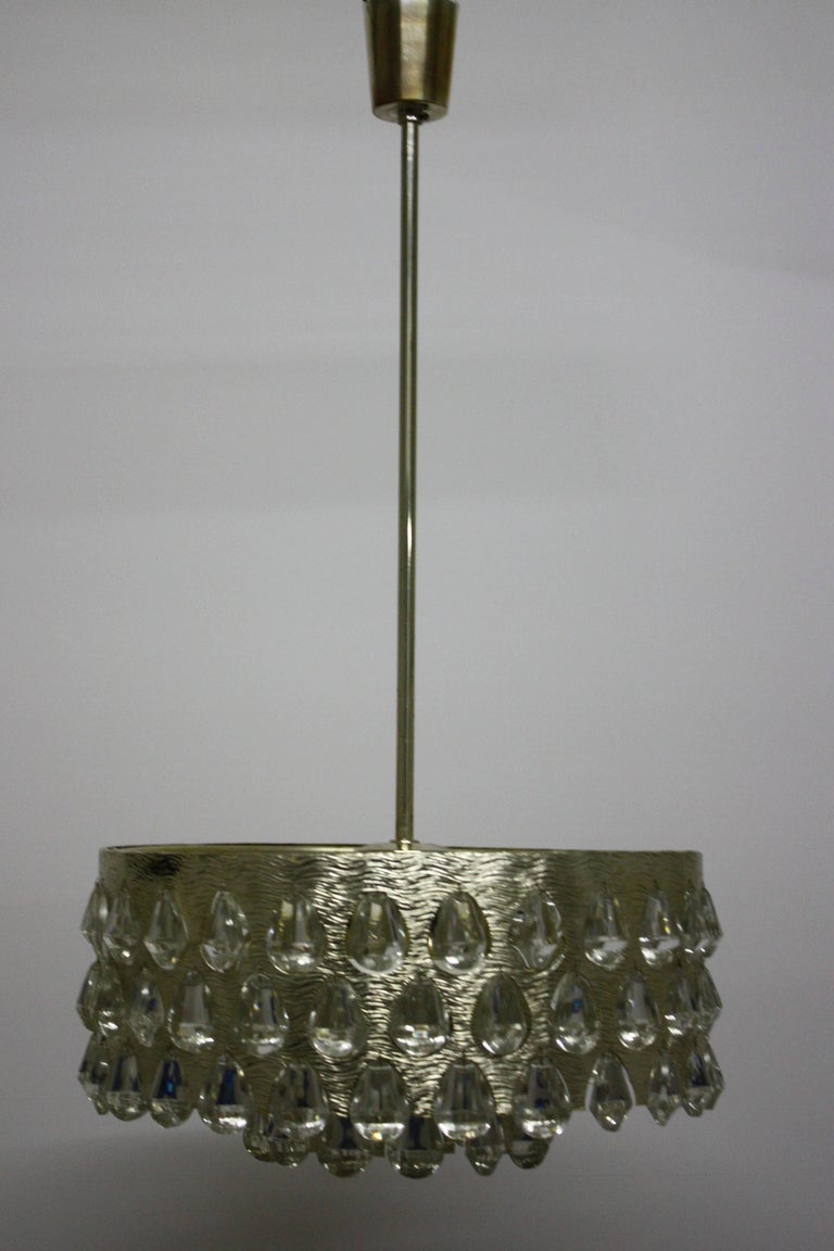 Amazing midcentury silvered brass and glass chandelier by Palwa, circa 1960s.
Socket: Six e14 and one e27 (Edison) for standard screw bulbs.
Excellent condition.