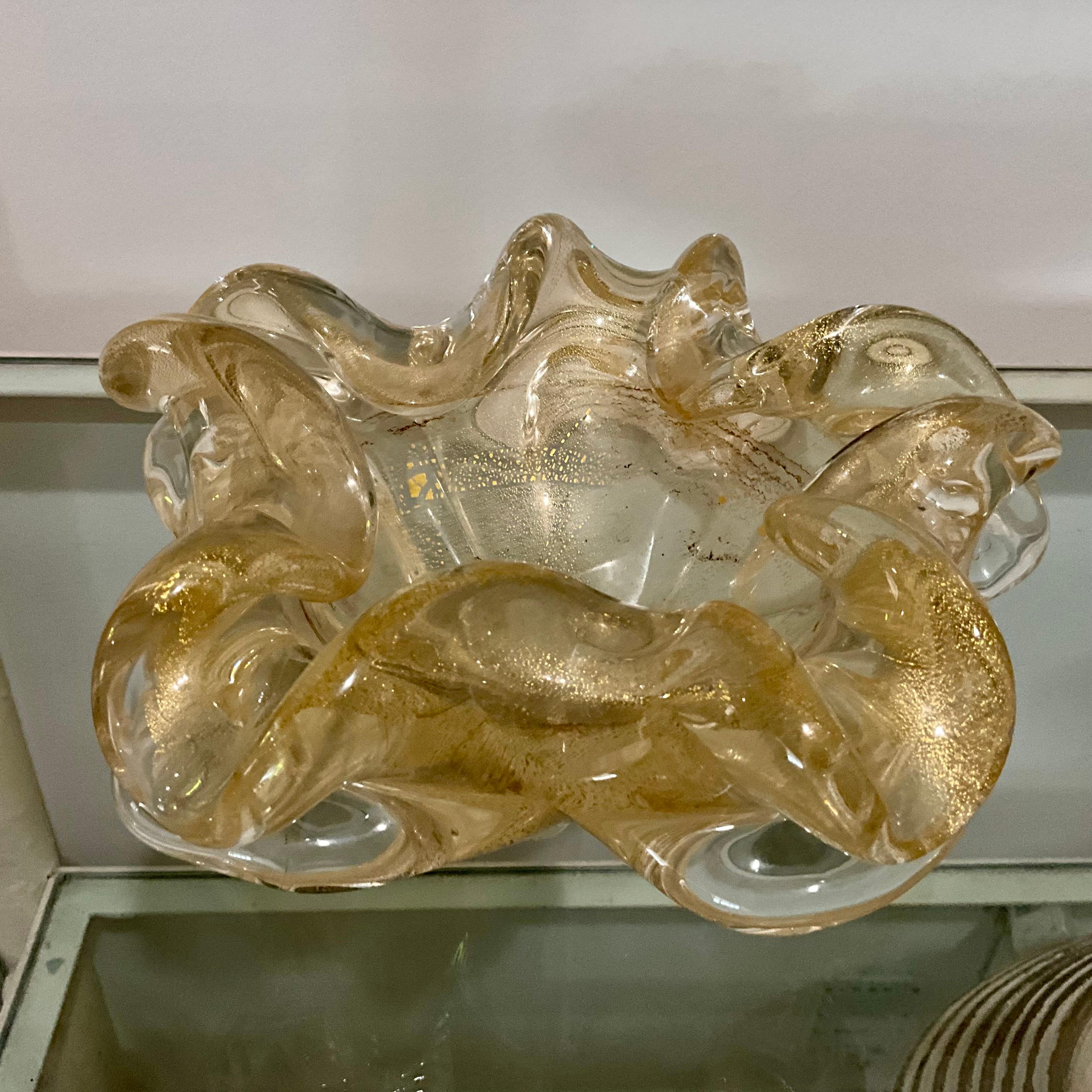 Titolo:
Grande ciotola in vetro di Murano della metà del 20° secolo di Barovier&Toso con riflessi in oro 24K, 10

In evidenza:
Uno straordinario centrotavola in vetro di Murano della metà del secolo scorso attribuito a Barovier&Toso, riccamente