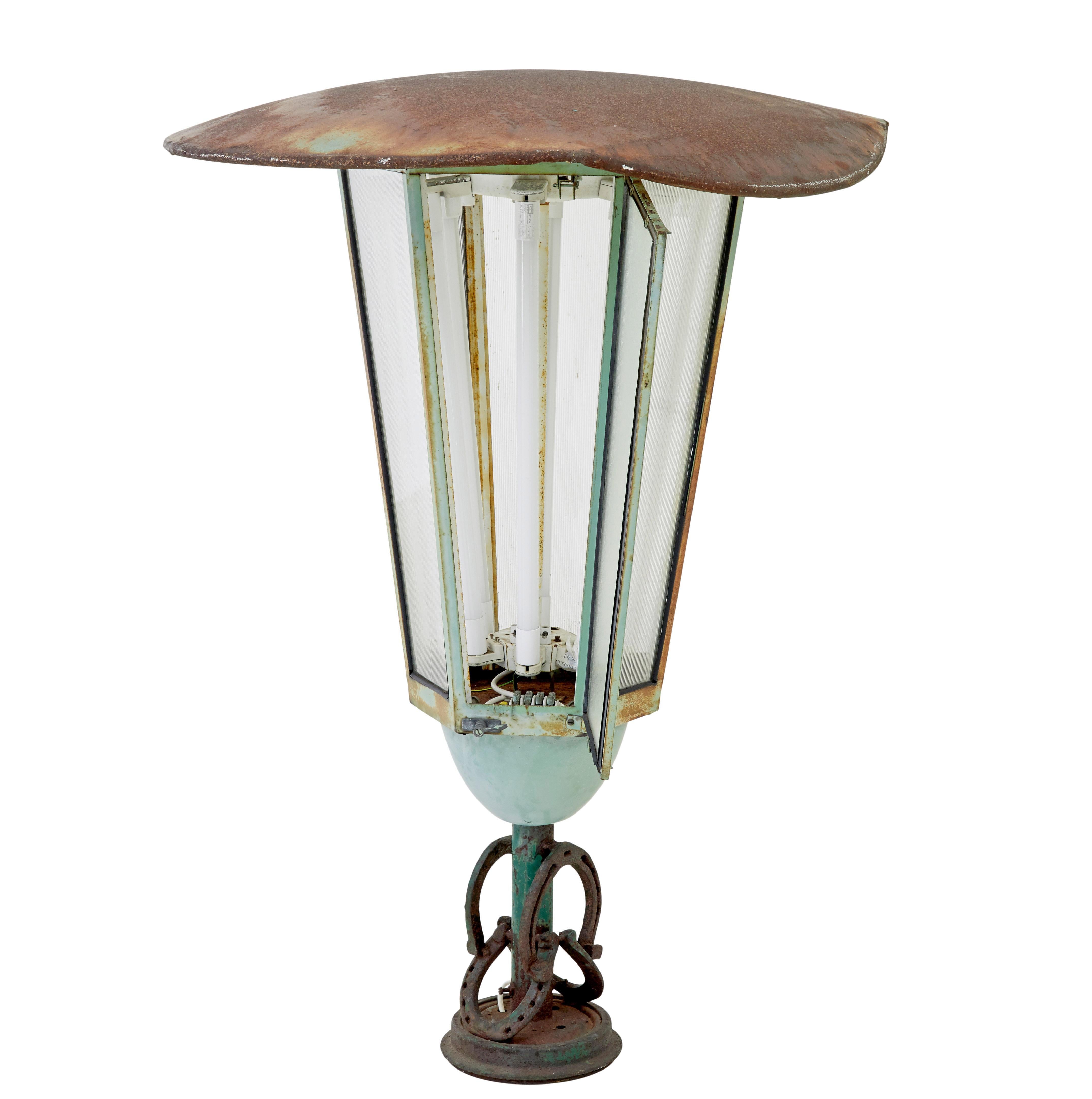 Unusual installation piece, siemens industrial light circa 1940/1950.

Stamped Siemens schuckertwerke ag.  We have had this light professionally re-wired and converted to led light bulbs.  Currently wired to a uk 3 pin plug.

6 sided main body with