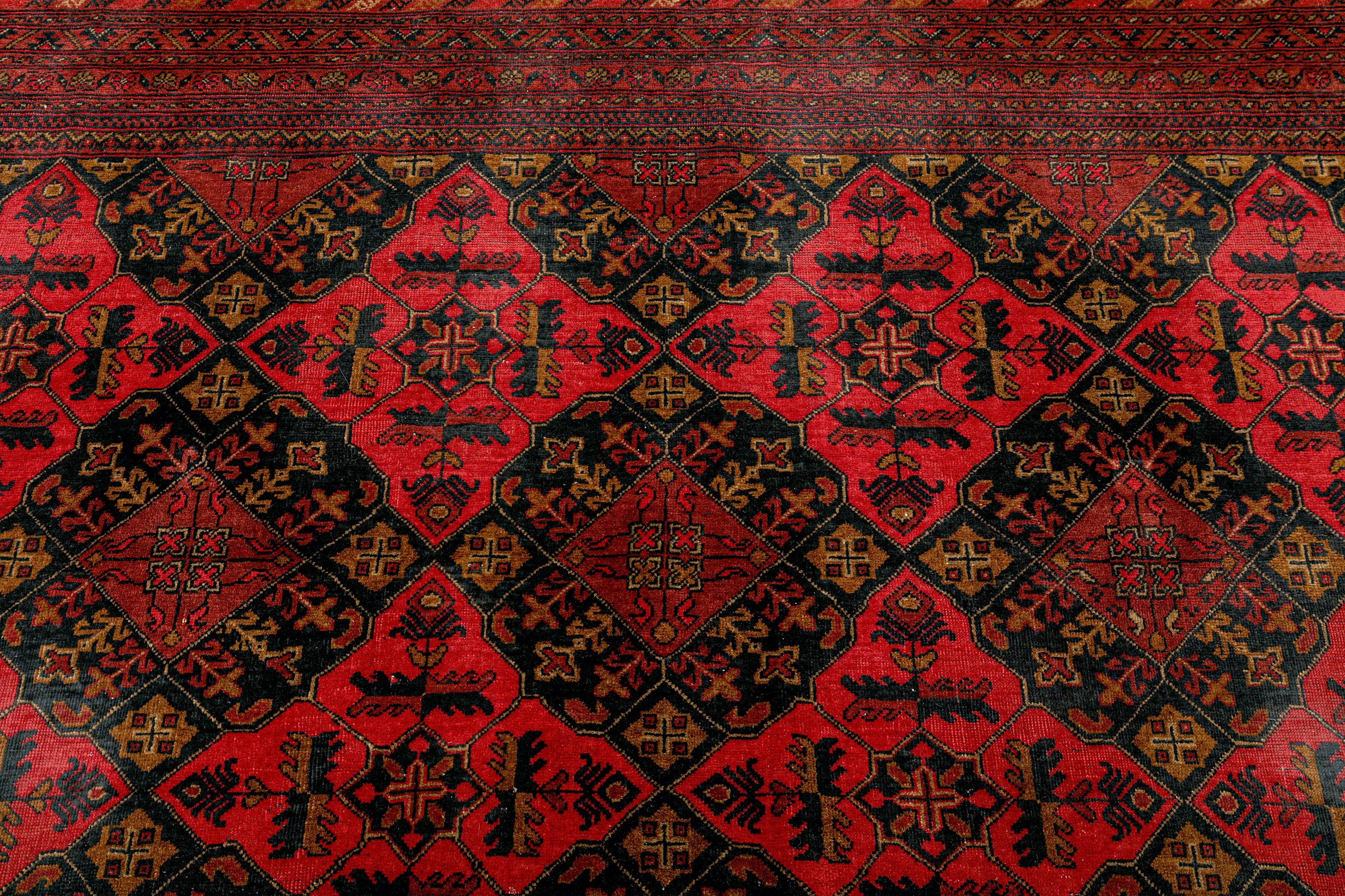 Großer afghanischer handgeknüpfter Wollteppich ''Khan'' aus der Mitte des Jahrhunderts 13ft x 10ft (Afghanisch) im Angebot