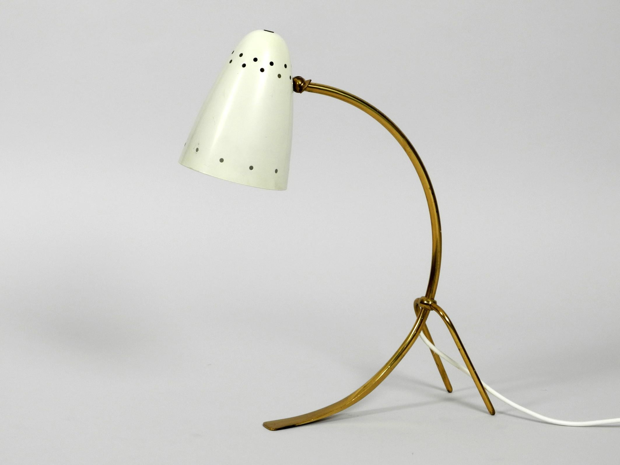 Very large midcentury brass metal table lamp. Made by J. T. Kalmar Vienna.
Made in Austria. Very nice design with many details, shade steplessly adjustable.
Slight scratches on the shade. Well to see at the photos.
Has been rewired due to