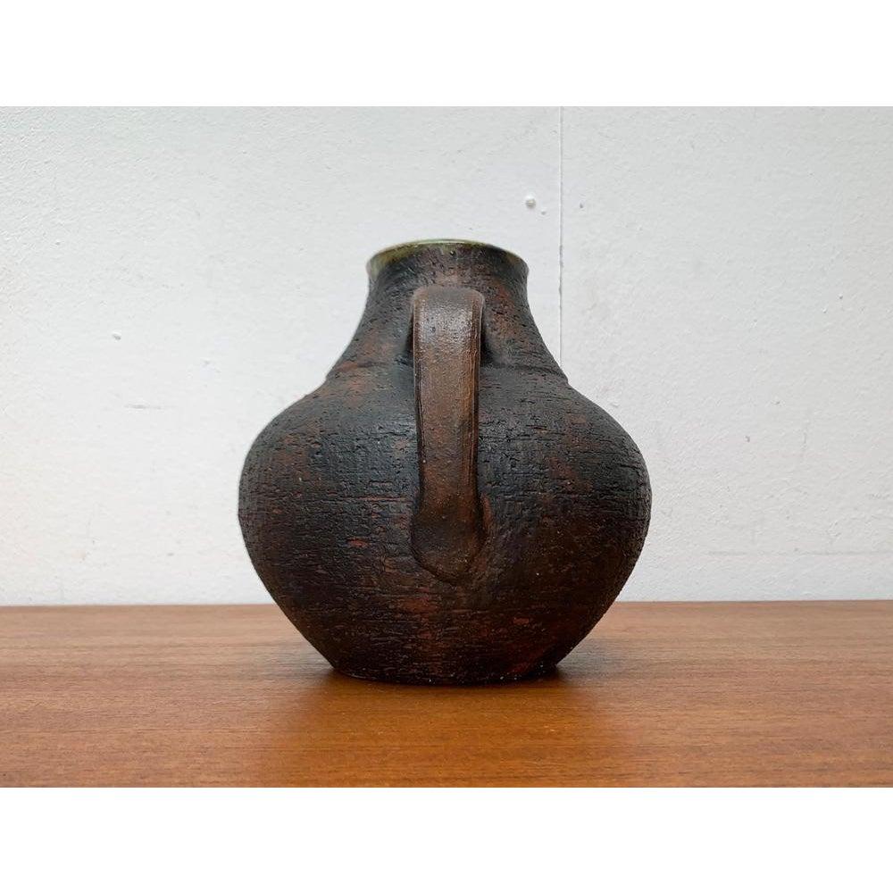 Large Mid-Century Brutalist Studio Pottery Carafe Vase by Gerhard Liebenthron, Germany, 1960s, in Very Good conditions. Designed 1960 to 1969 This piece has an attribution markIt is completely authentic 

Additional information:
Materials: