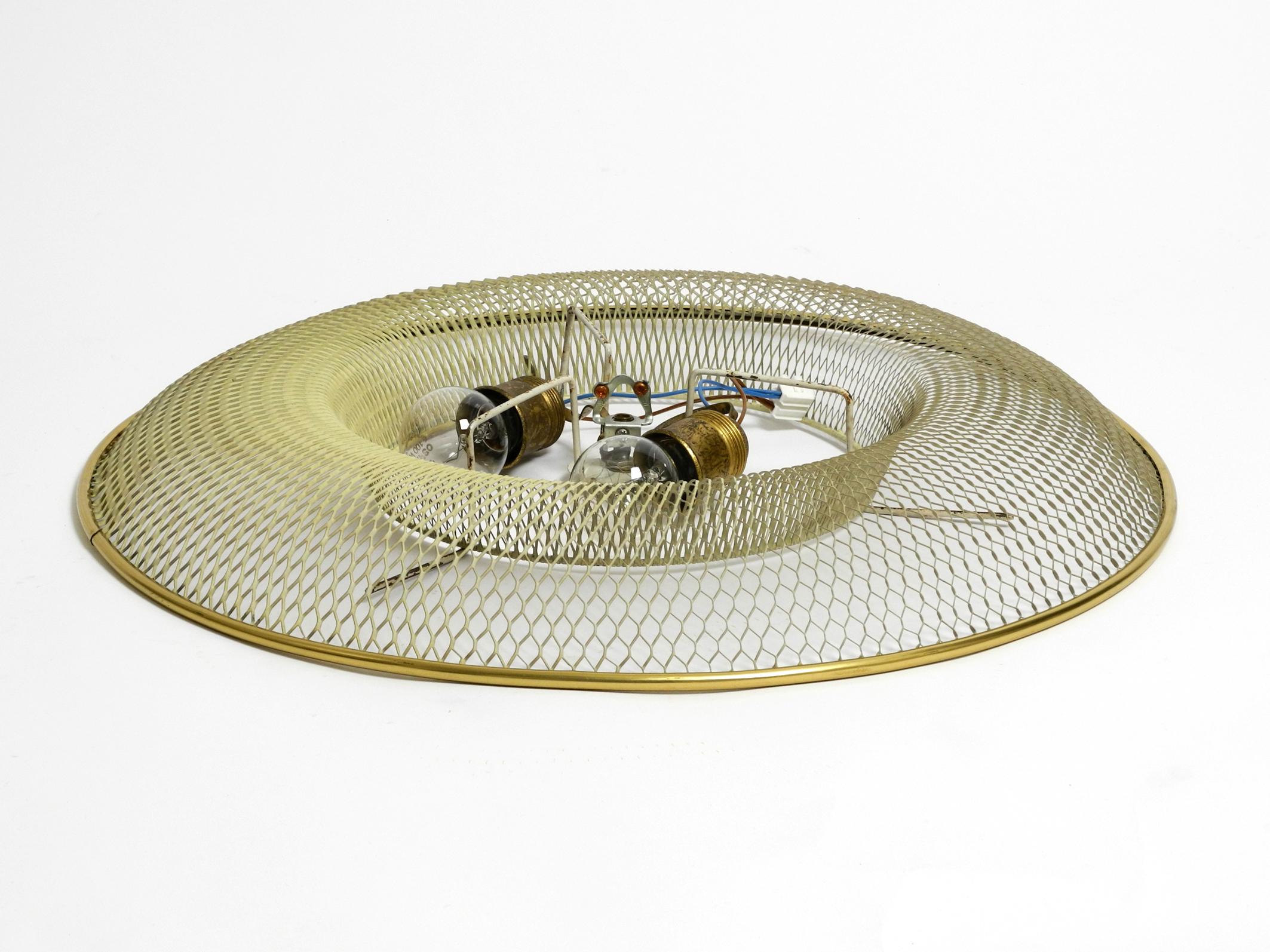 Metal Large Mid Century ceiling lamp from ERCO made of expanded metal and plastic For Sale