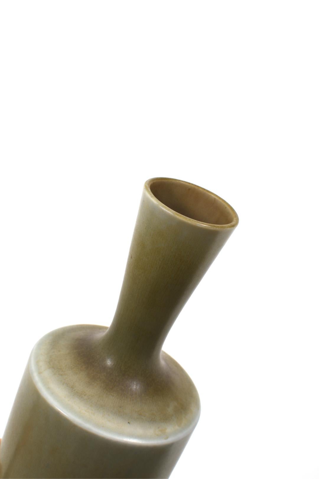 Stoneware vase from Gustavsberg by Berndt Friberg green Harpel glaze with brown shades. Signed Friberg and Studiohanden.