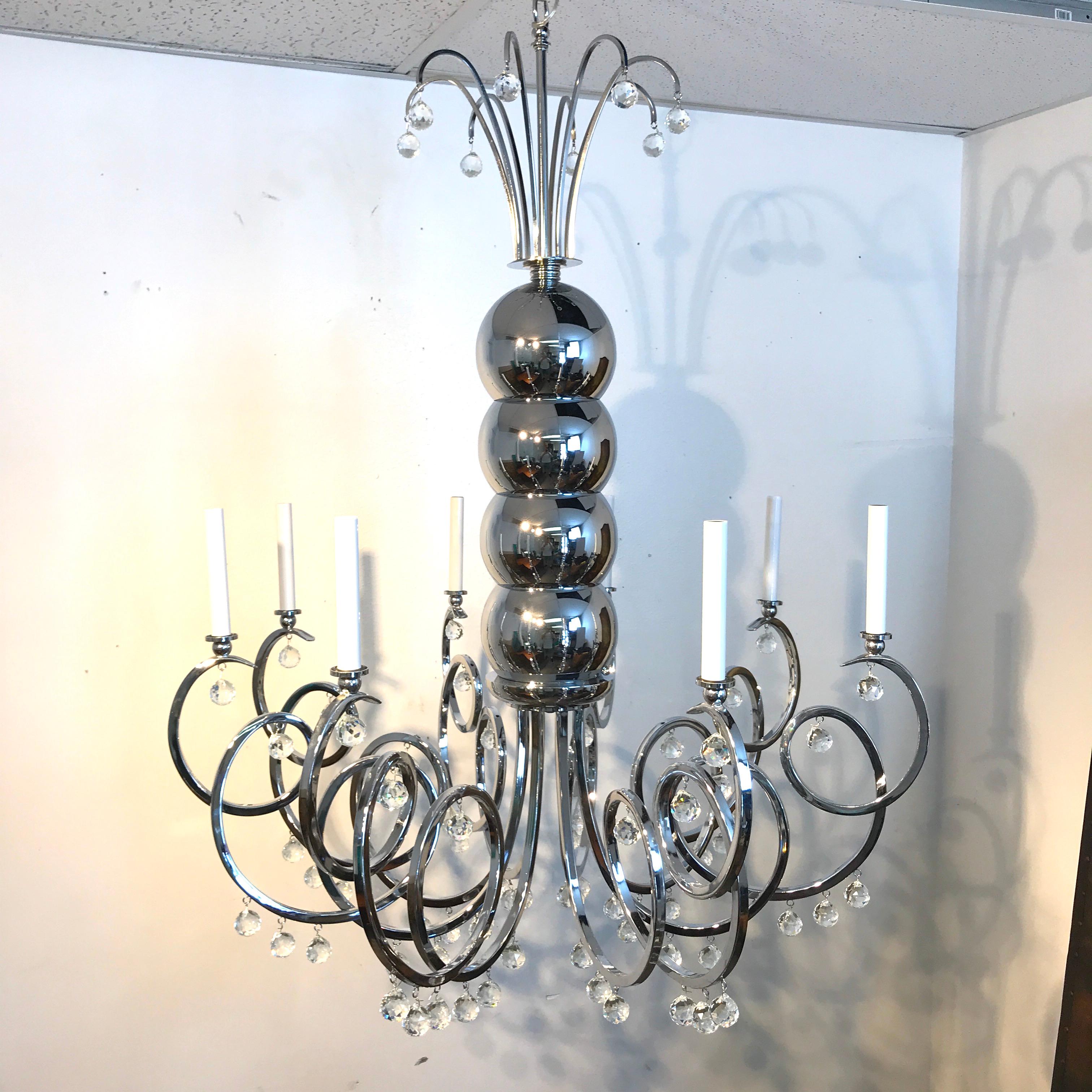 Poli Grand lustre à huit lumières en chrome et cristal du milieu du siècle dernier en vente
