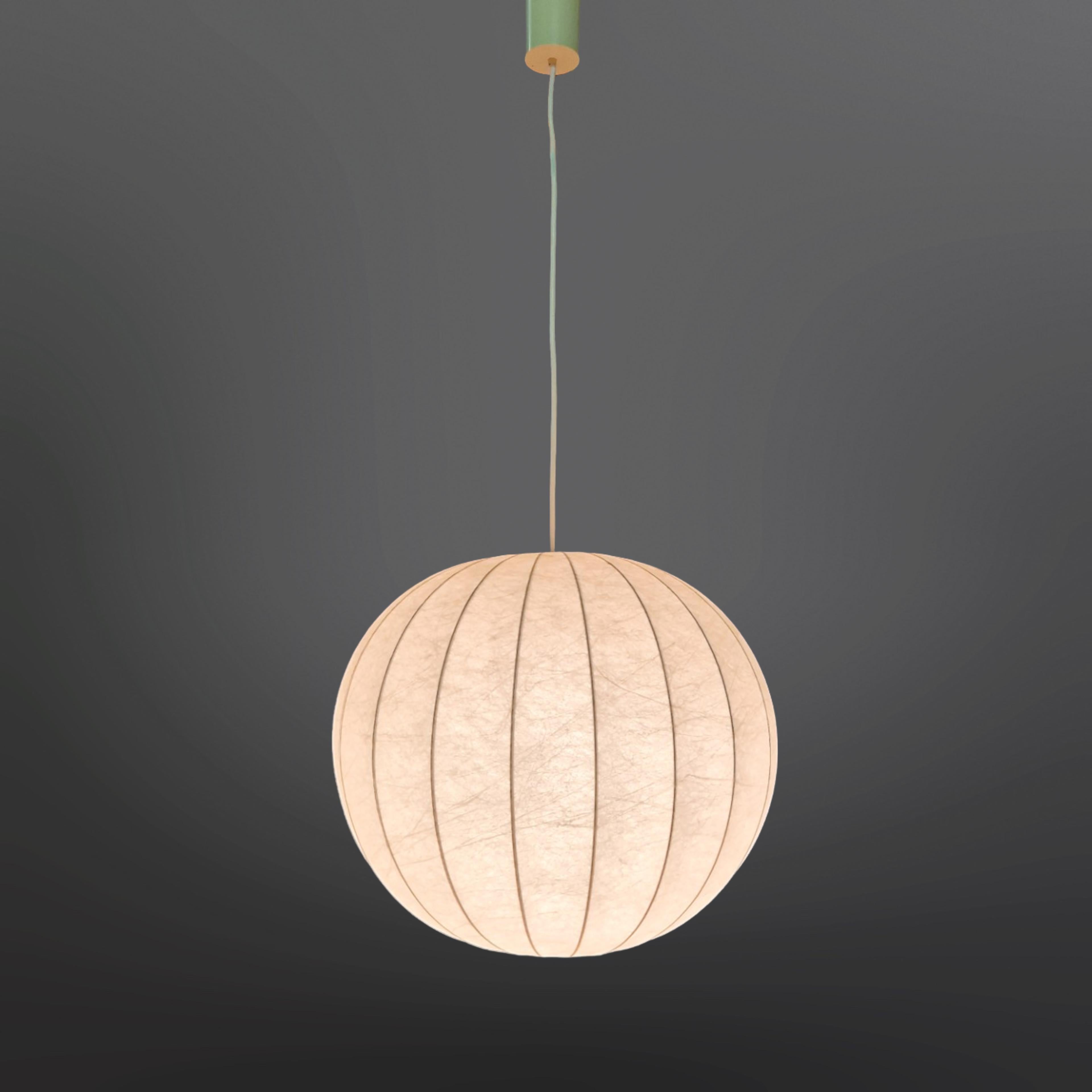 Large cocoon pendant lamp. In the style of Pier and Achille Castiglioni. Most likely made by German company Goldkant leuchten in the 1960s. 
The lamp has a metal wire frame with some sort of rubber surrounding it. The design resembles Chinese