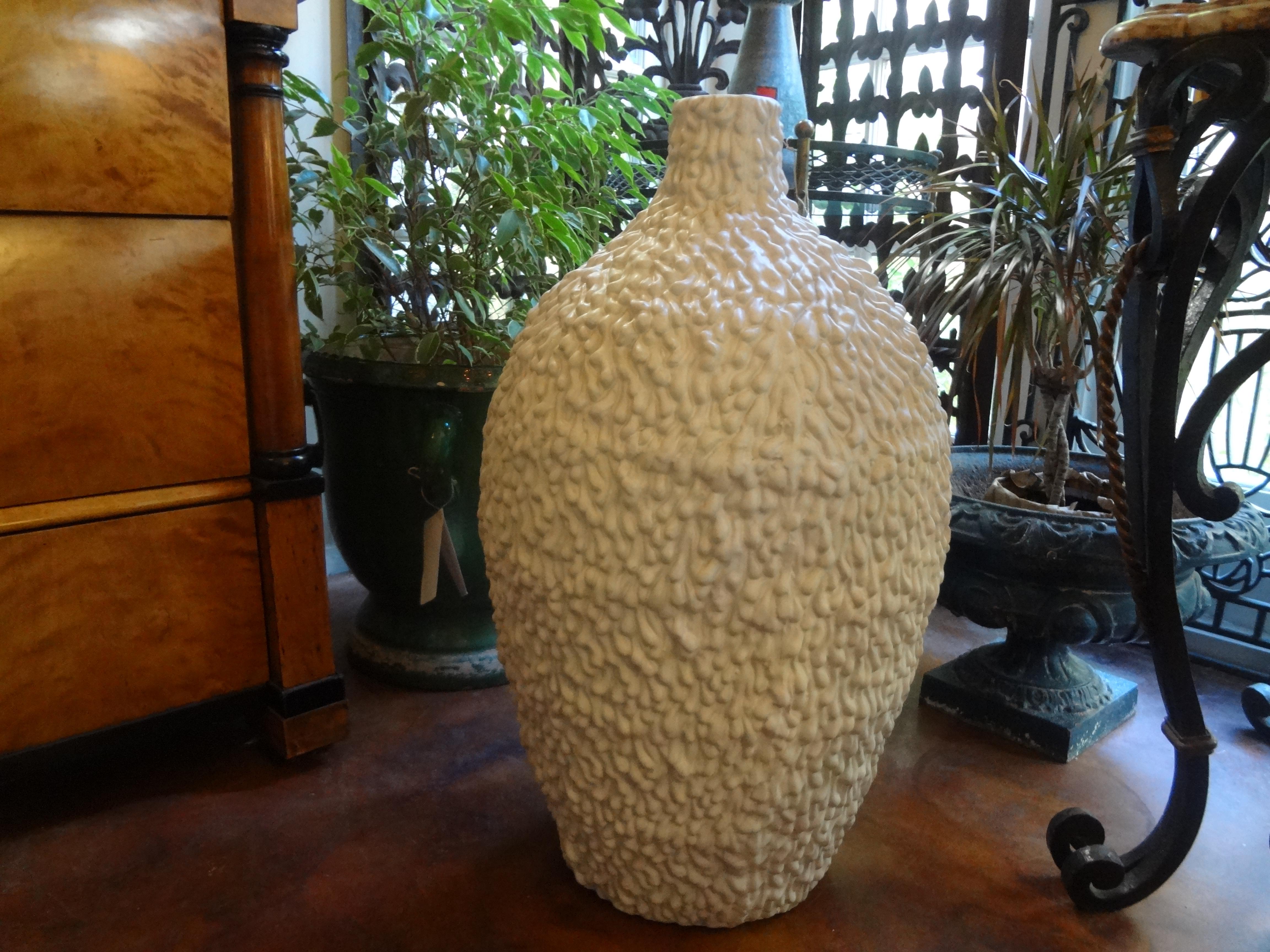 Huge Midcentury Drip Glaze Ceramic Urn.
Huge white Mid-Century Modern drip glaze ceramic urn, vessel or vase. This large, 27 inch urn is a fabulous decorative accessory or could easily be converted into a table lamp.