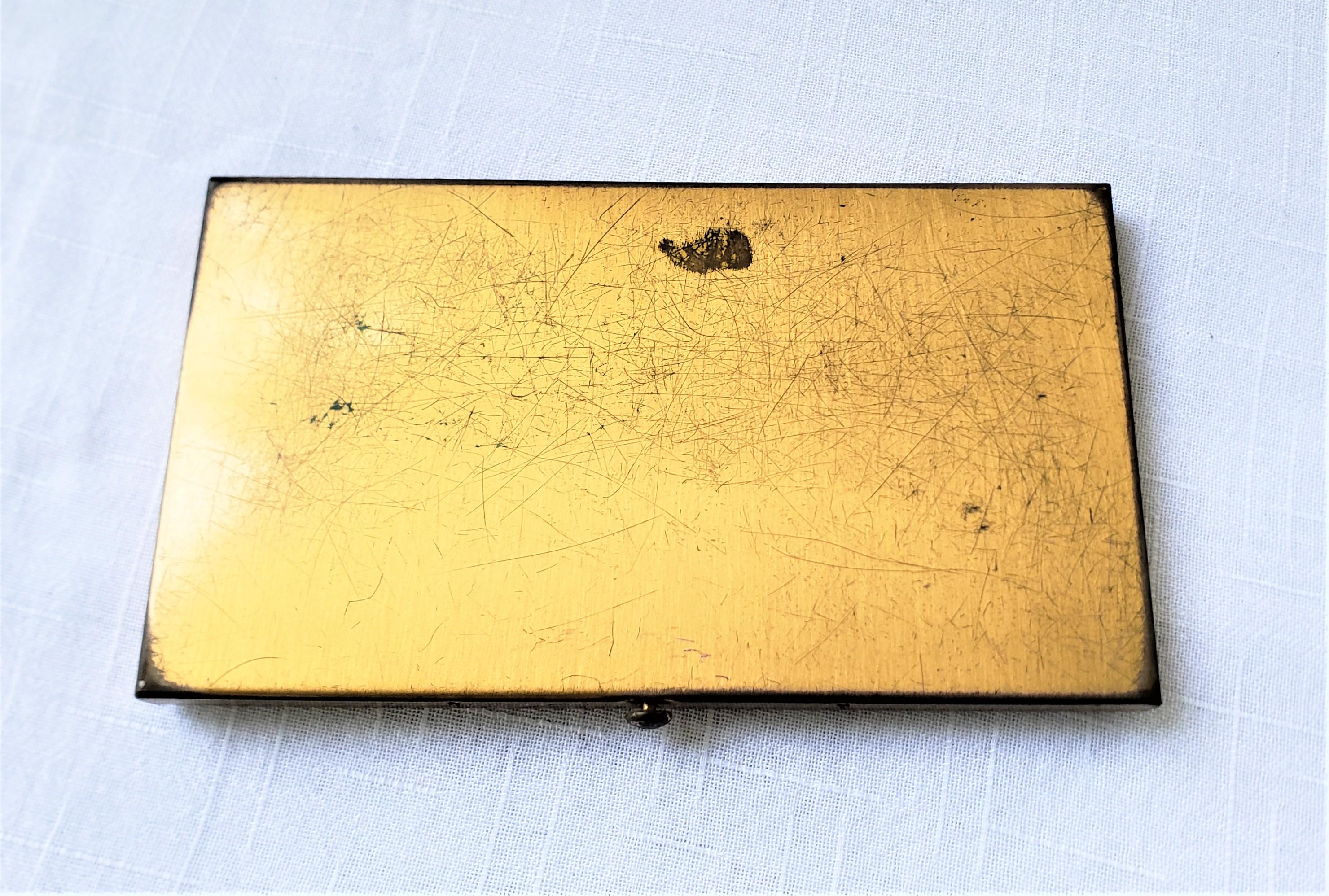 Canadian Large Mid-Century Era Metal Cigarette Case with World Globe & Compass Decoration For Sale