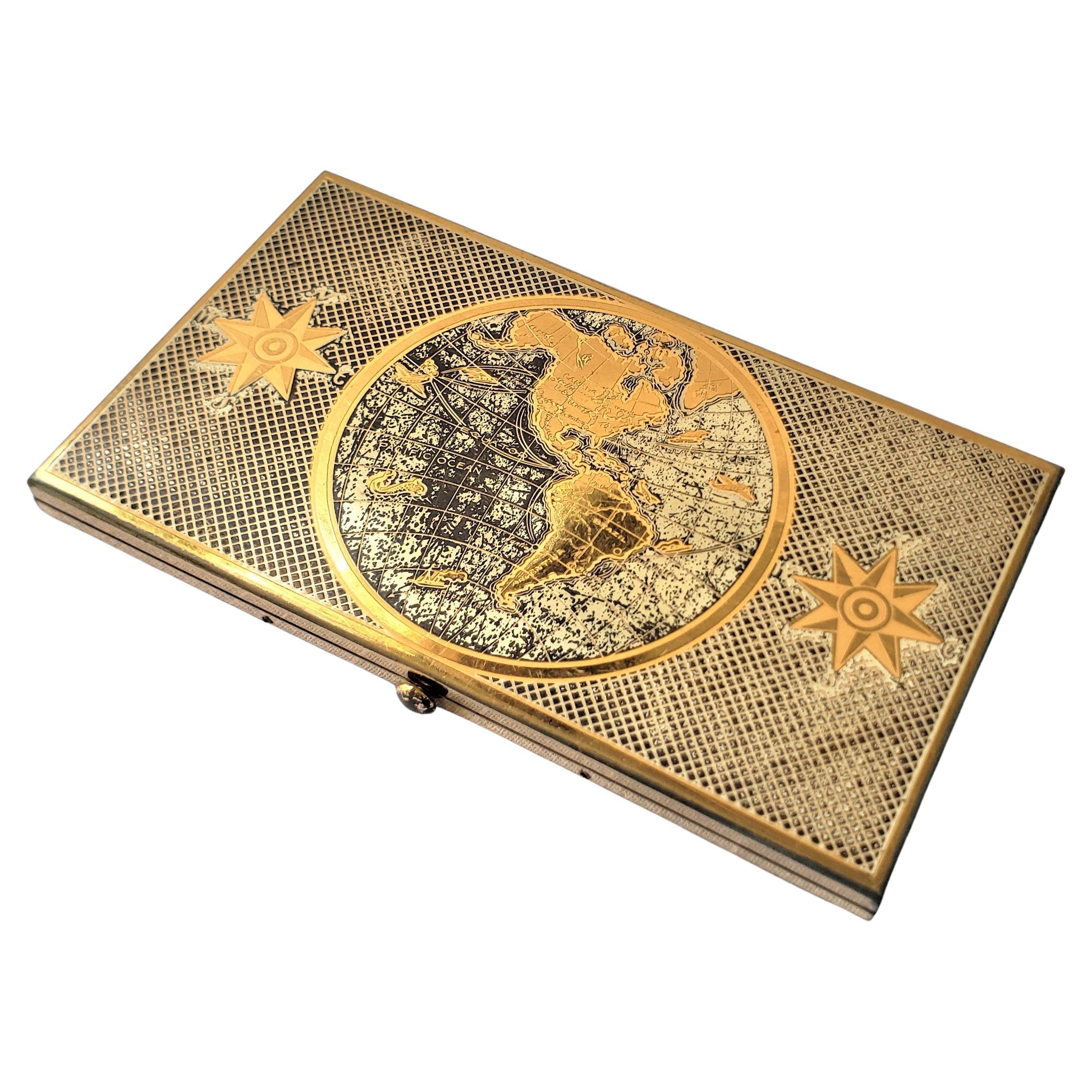 Large Mid-Century Era Metal Cigarette Case with World Globe & Compass Decoration For Sale