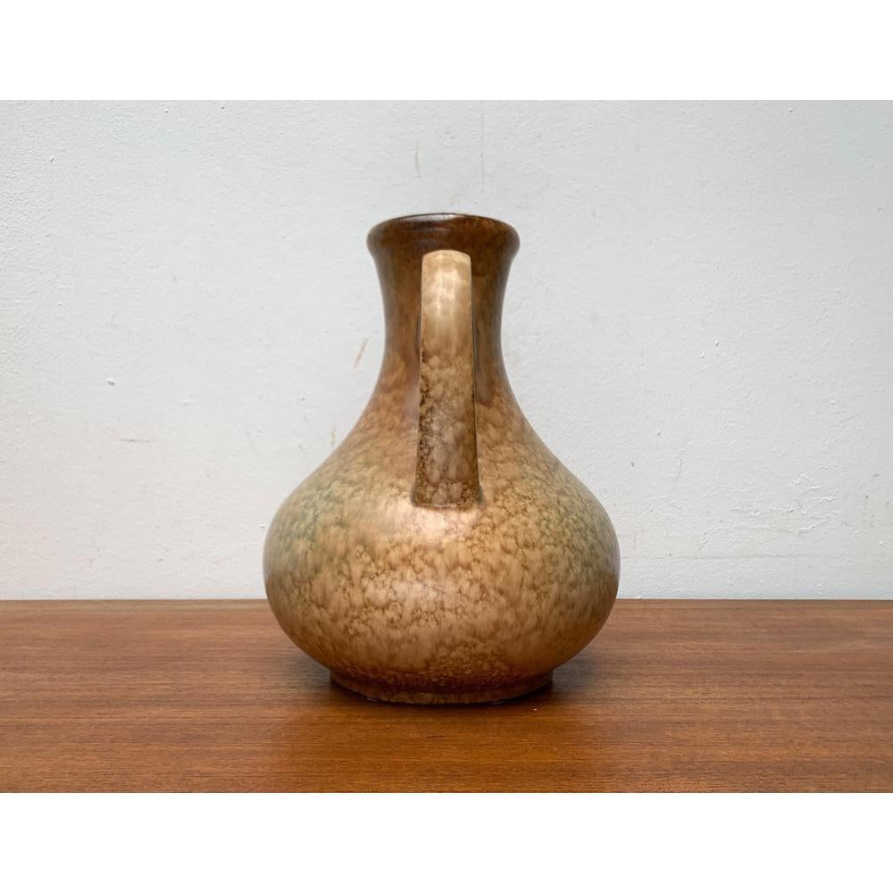 Grande vaso tedesco di metà secolo di Dümler & Breiden, anni '60, in ottime condizioni. Progettato tra il 1960 e il 1969 Questo pezzo ha un marchio di attribuzione.

Informazioni aggiuntive:
Materiali: Ceramica
Stile: Medioevo Moderno
Paese di